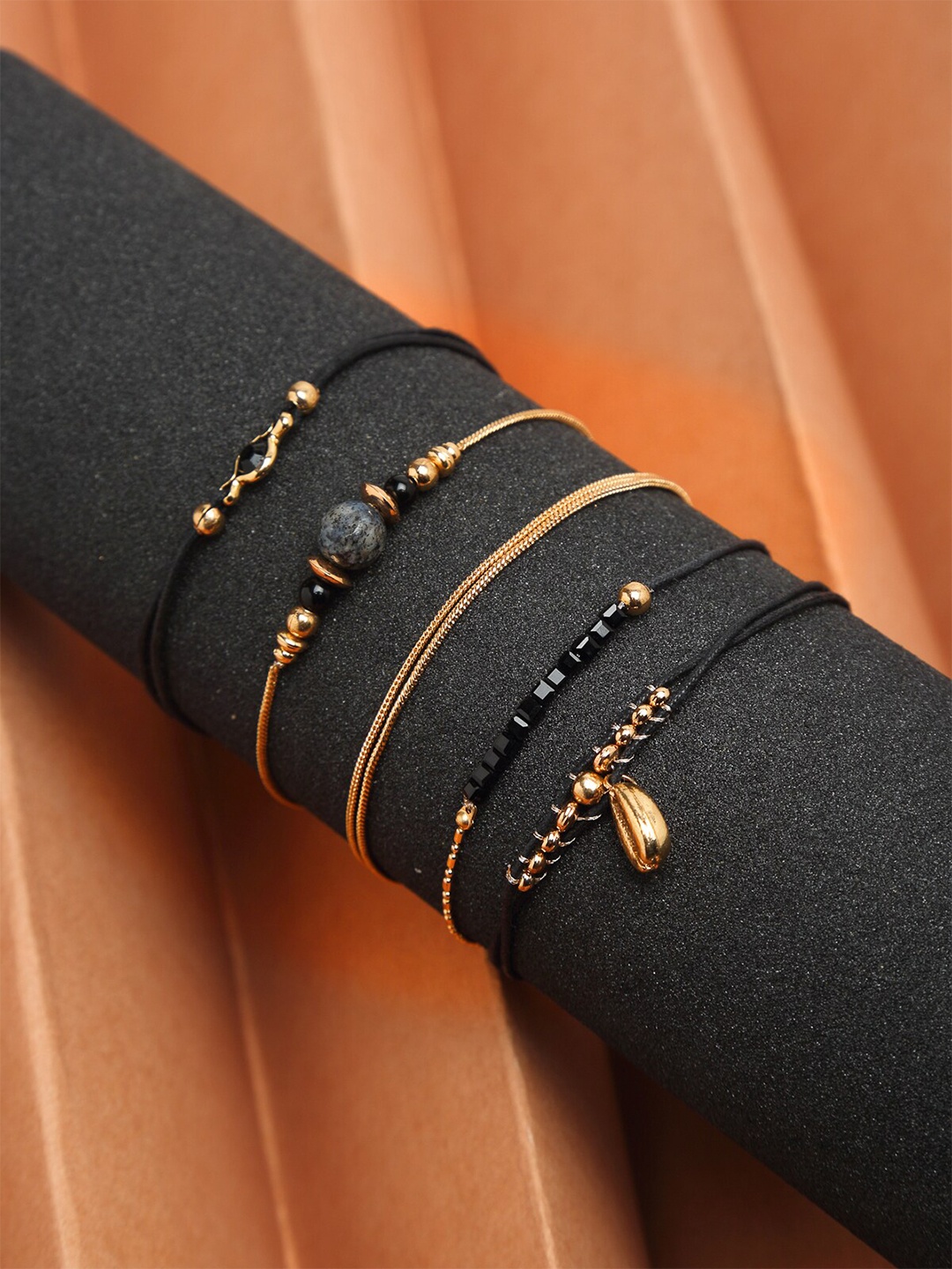 

Madame Women 4 Rose Gold & Black Rose Gold-Plated Charm Bracelet