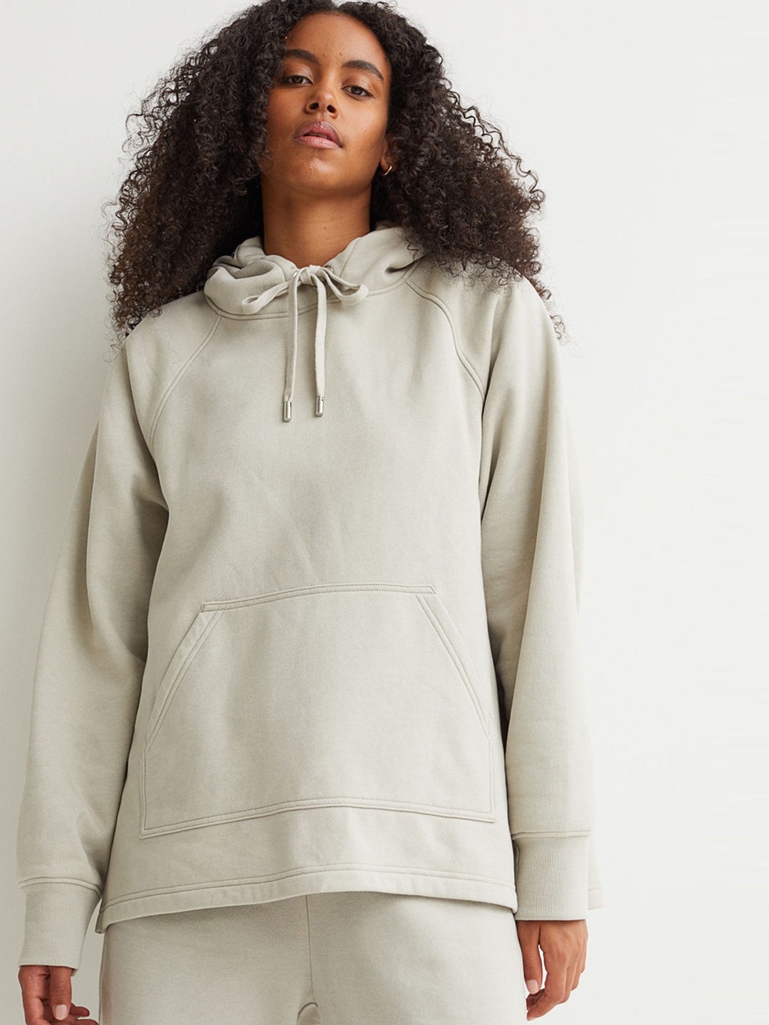 

H&M Women Grey & Beige Solid Hoodie