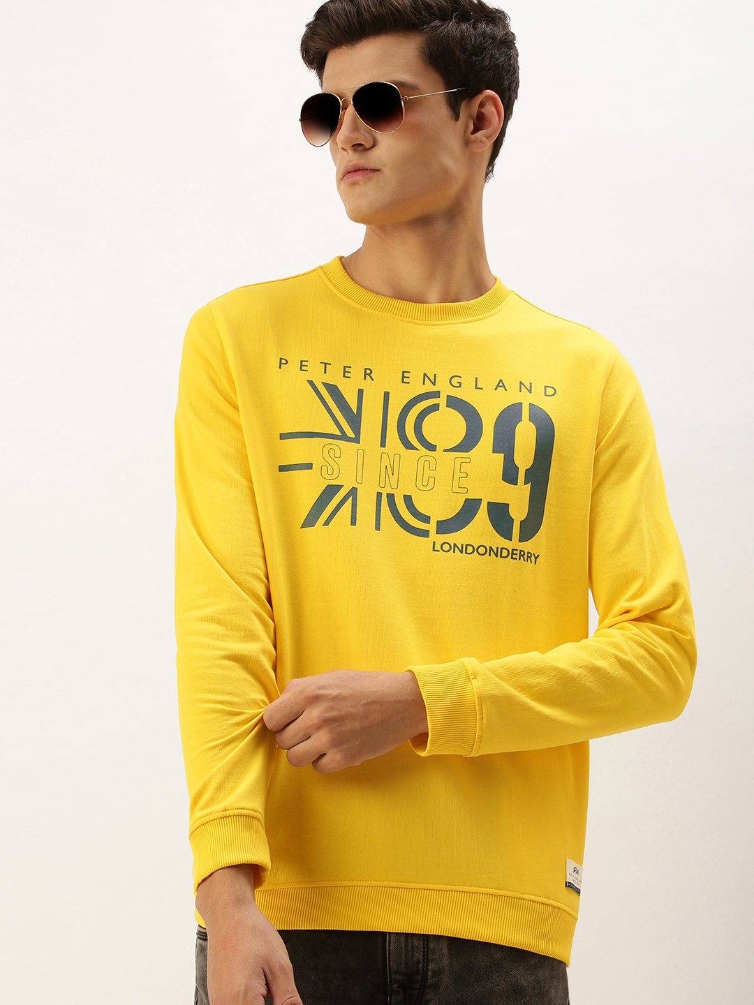 

Peter England Men Yellow & Black Printed Sweatshirt