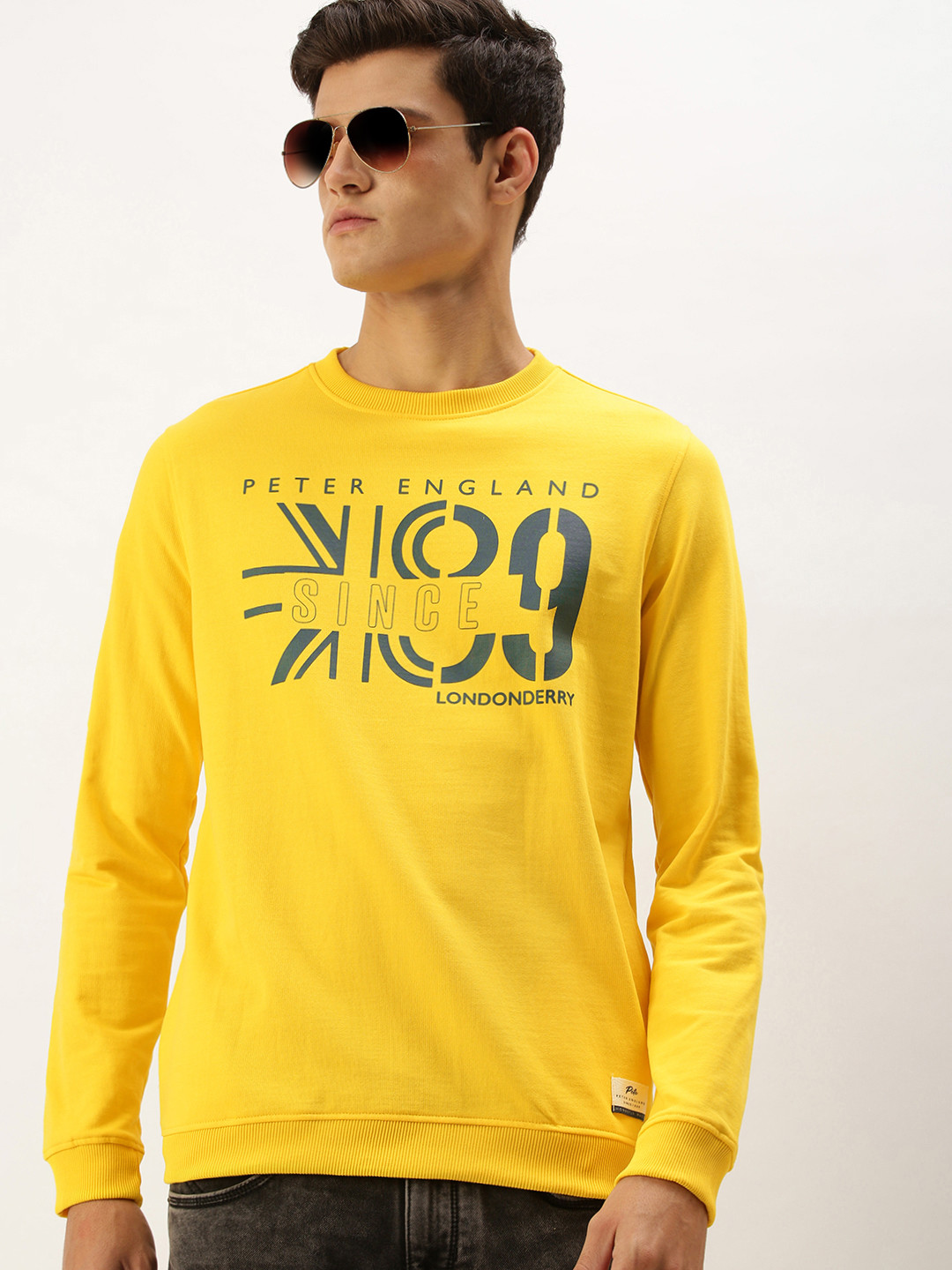 

Peter England Men Yellow Printed Sweatshirt