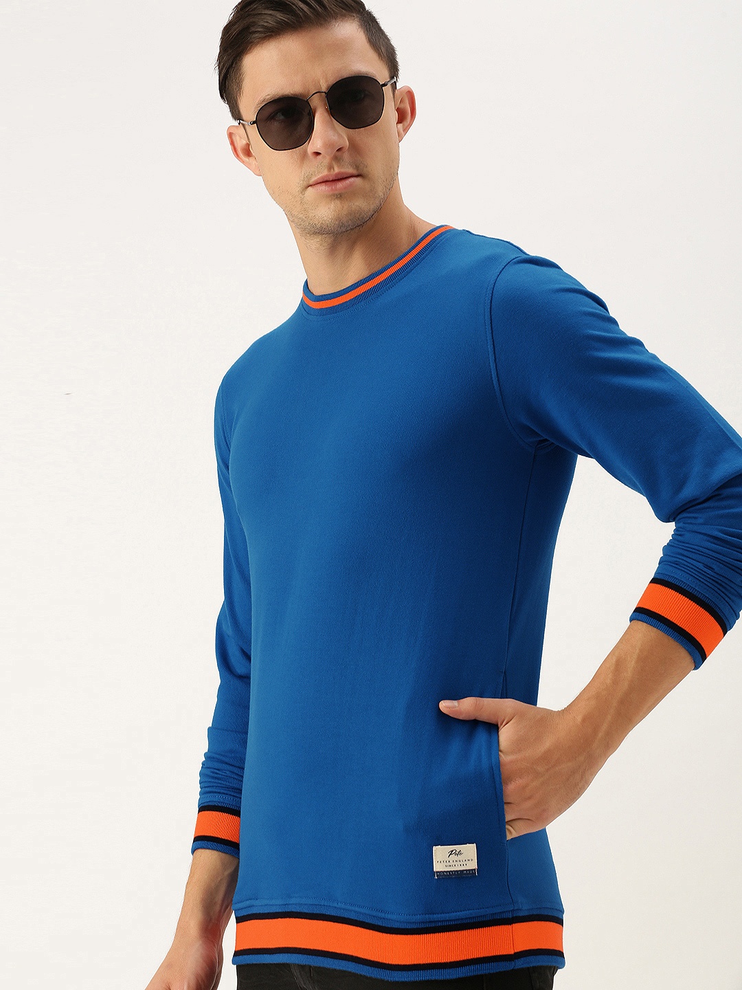 

Peter England Men Blue & Orange Solid Sweatshirt