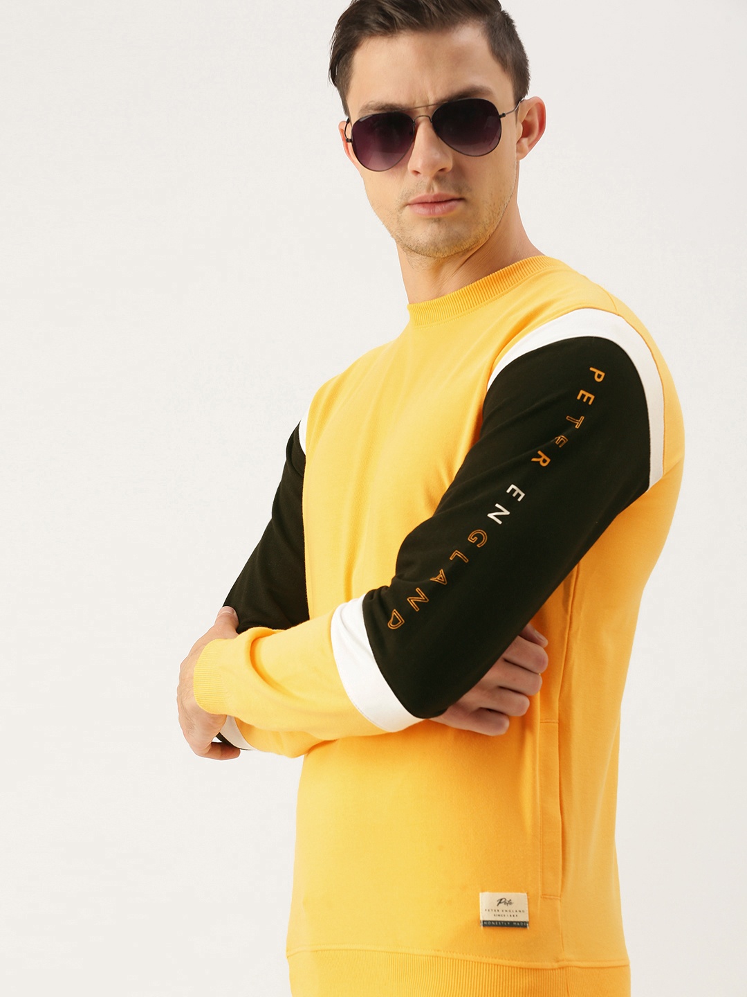 

Peter England Men Yellow & Black Colourblocked Sweatshirt