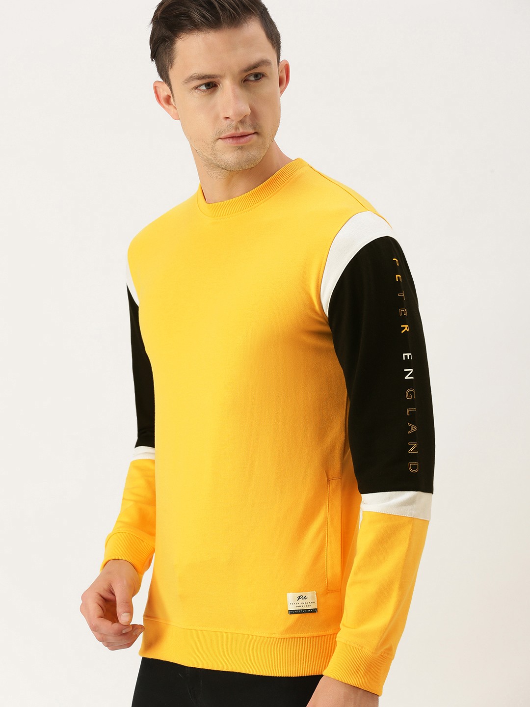 

Peter England Men Yellow & Black Colourblocked Sweatshirt