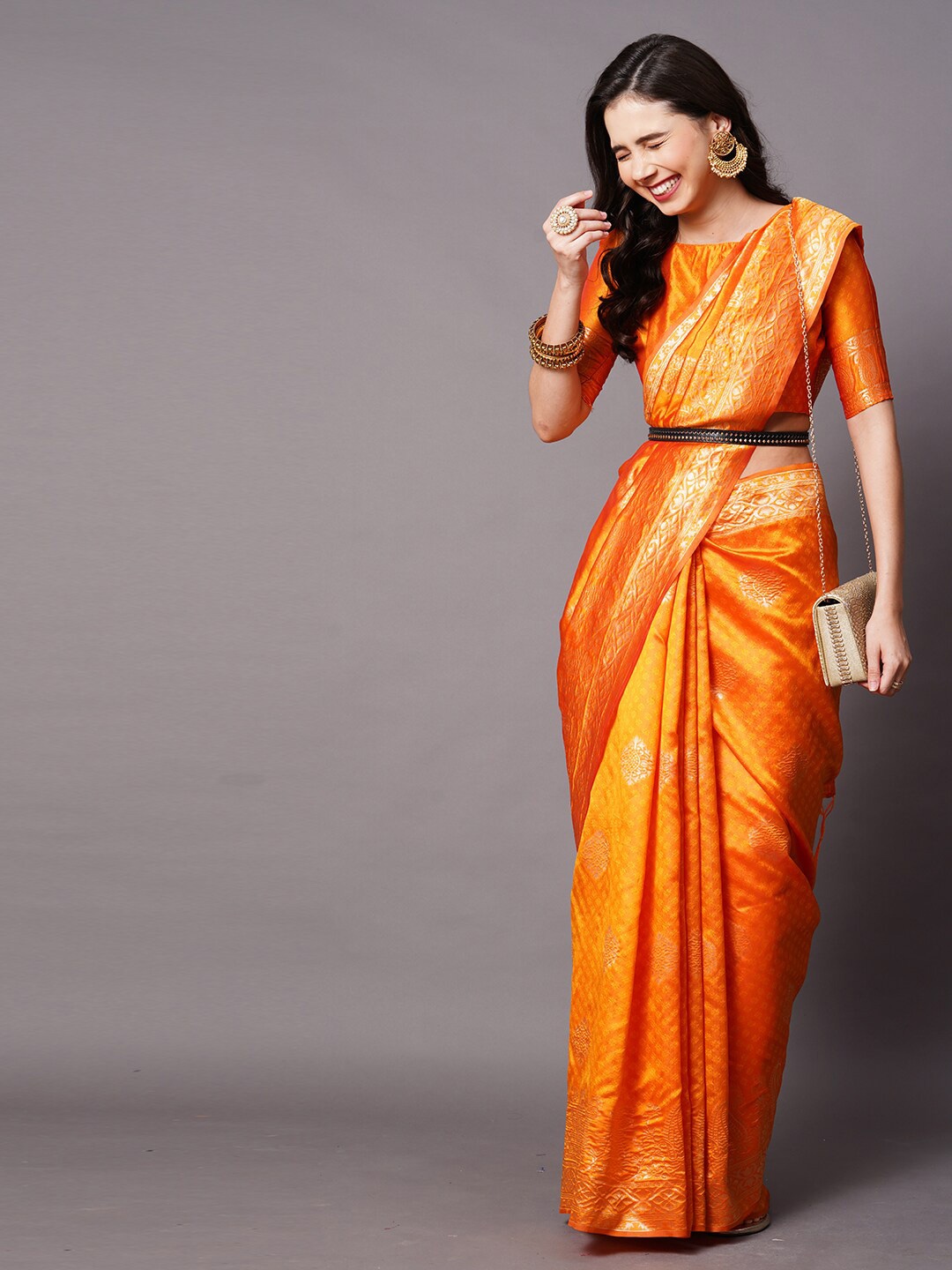 

Mitera Orange & Gold-Coloured Ethnic Motifs Zari Silk Blend Banarasi Saree