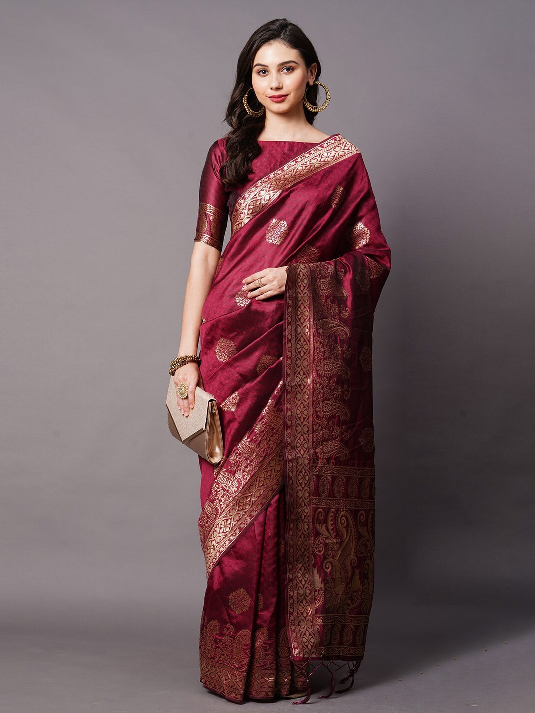 

Mitera Maroon & Gold-Coloured Ethnic Motifs Zari Silk Blend Banarasi Saree