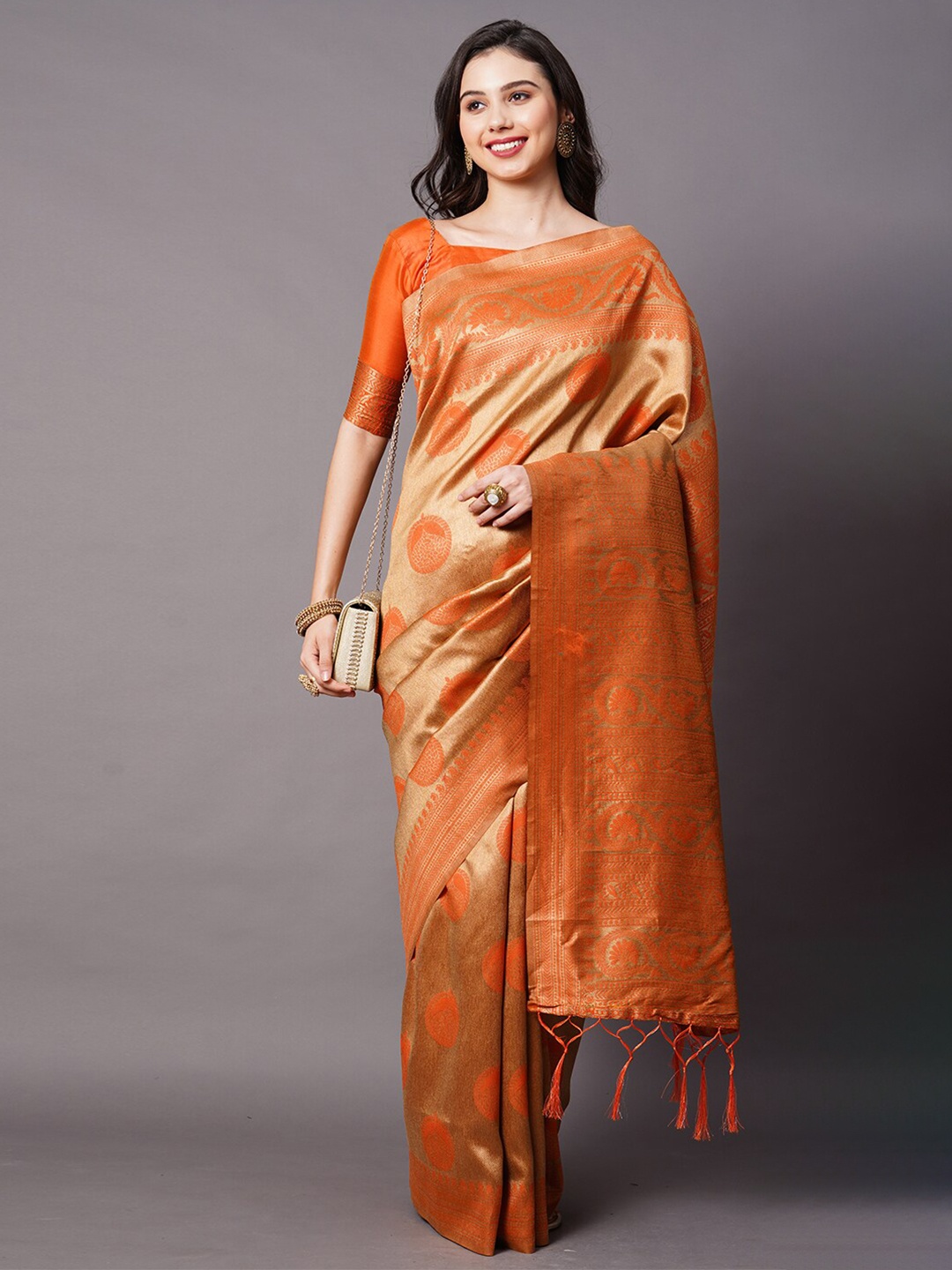 

Mitera Orange & Gold-Toned Ethnic Motifs Zari Silk Blend Baluchari Saree