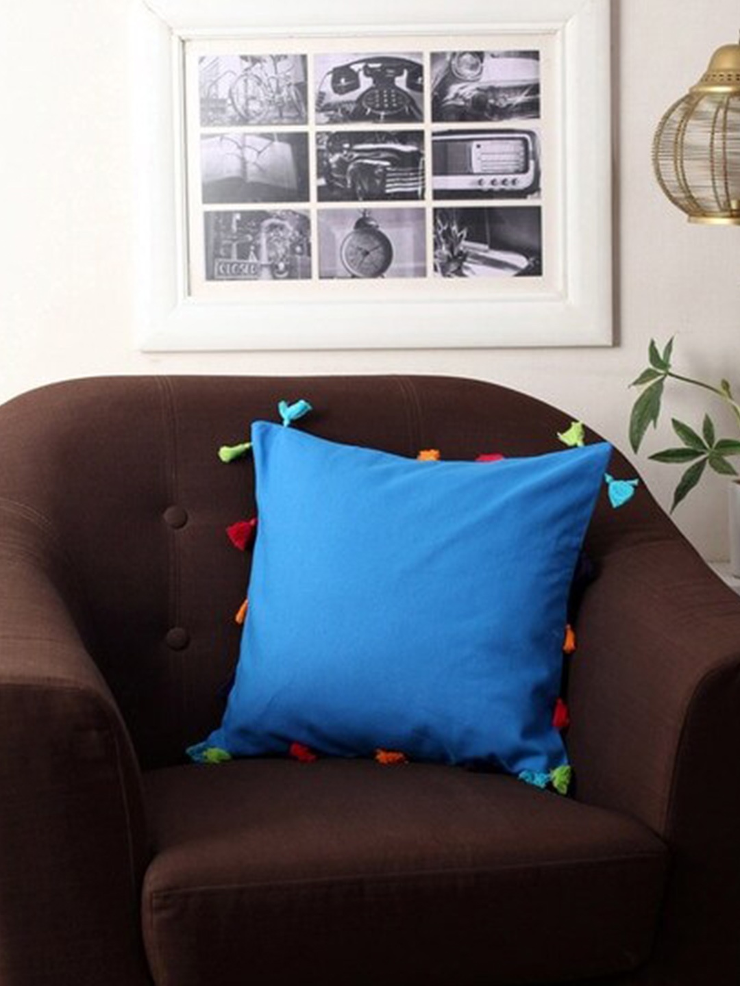 

Lushomes Blue Square Cotton Cushion Covers with Colorful Tassels