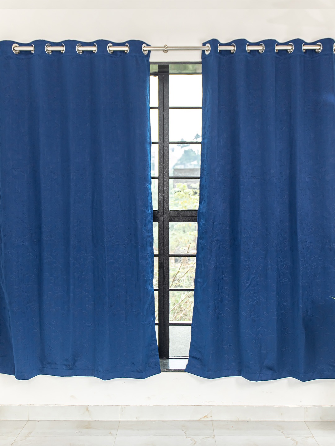 

Livpure Smart Blue Set of 2 Self Design Black Out Door Curtain