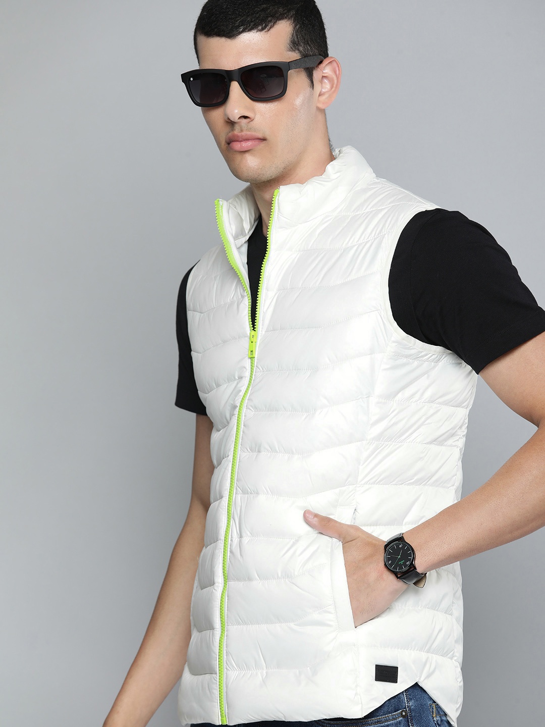 

Flying Machine Men White Solid Sleeveless Casual Padded Jacket