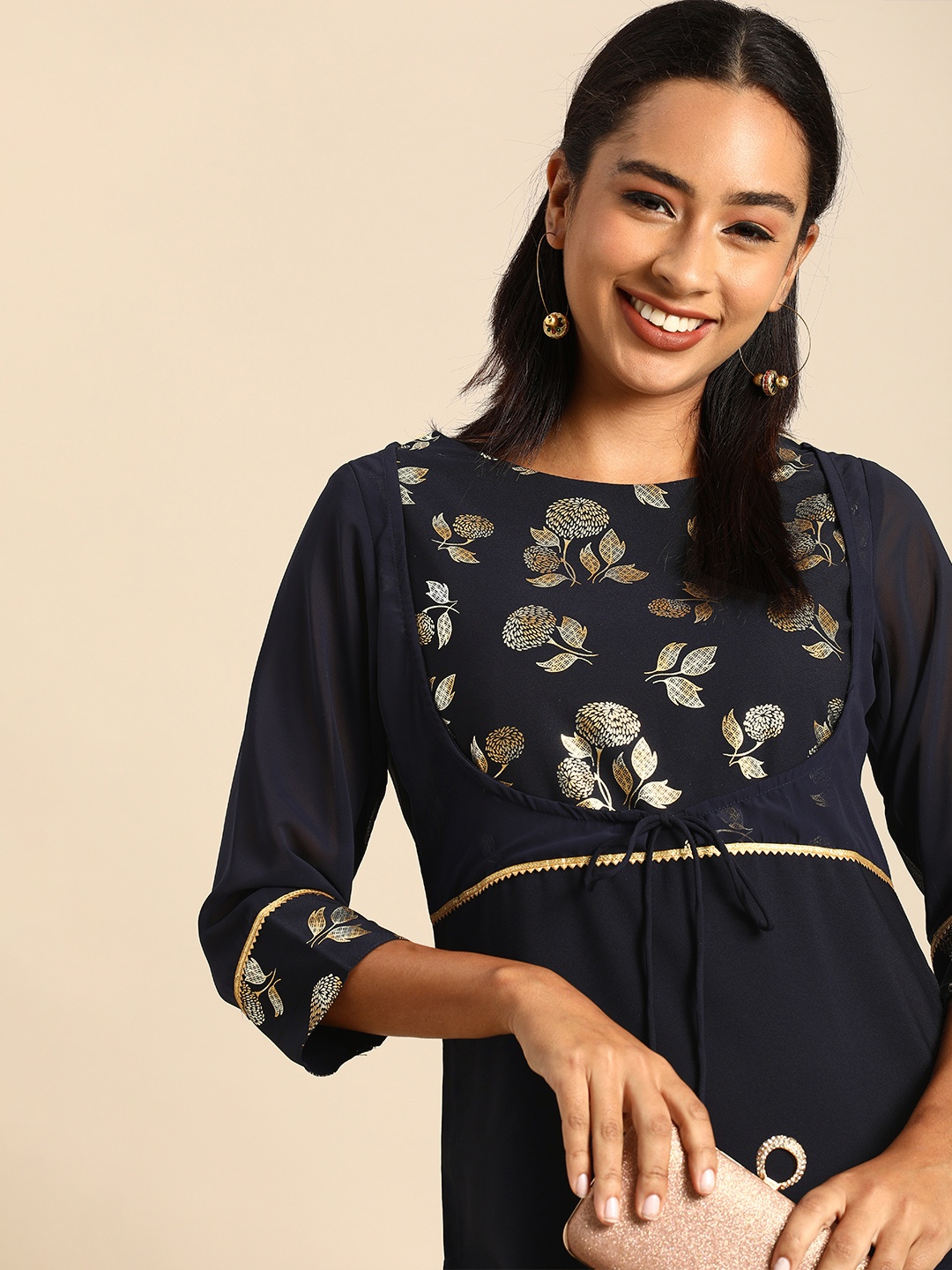 

Janasya Women Navy Blue Floral Yoke Design Gotta Patti Crepe Kurta
