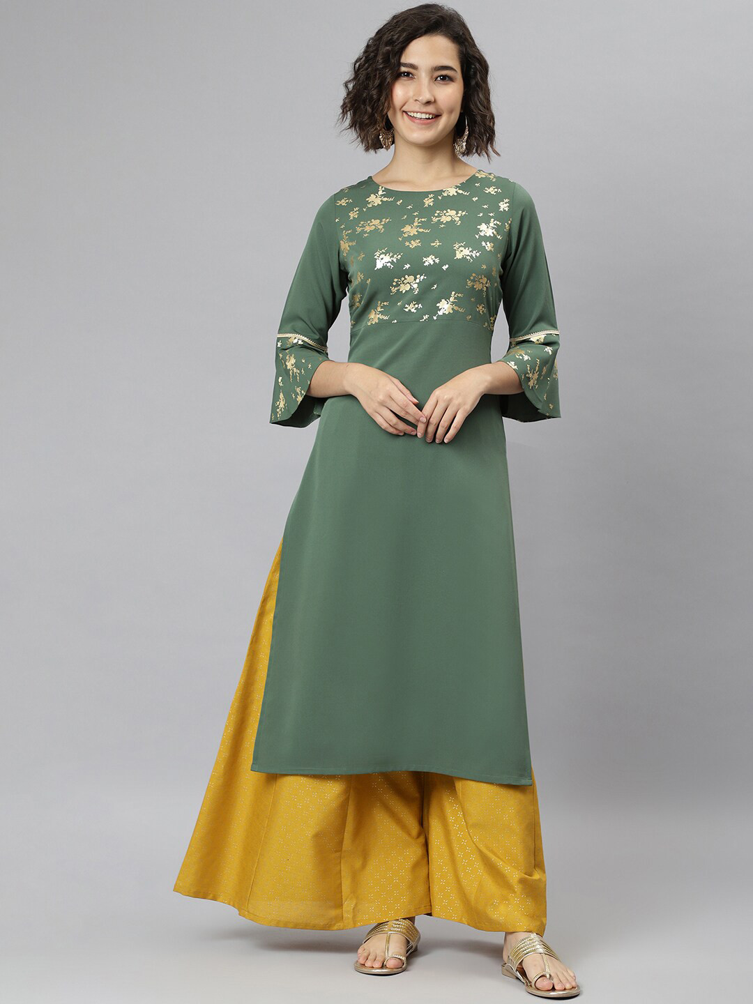 

Janasya Women Green Floral Yoke Design Flared Sleeves Thread Work Crepe Kurta