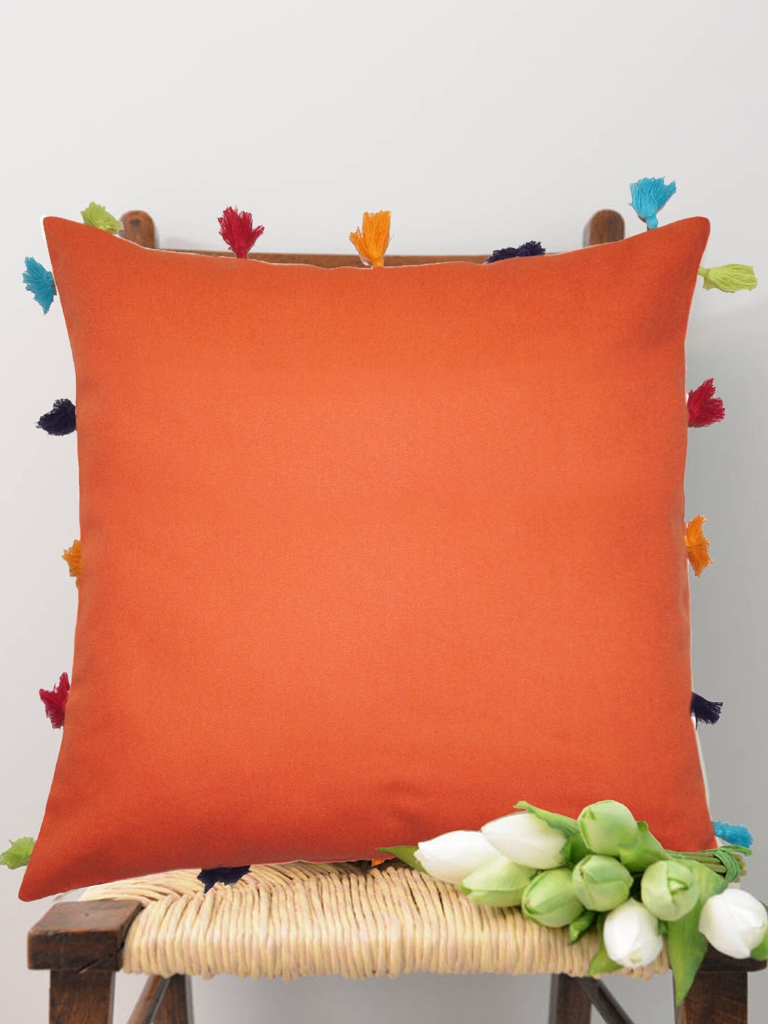 

Lushomes Orange Set of 3 Square Cushion Covers With Multi-Coloured Tassels