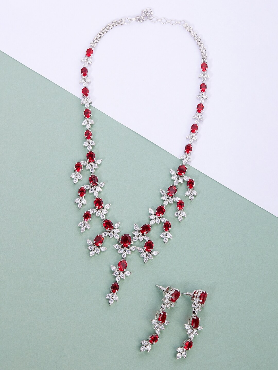 

GloBox By ZeroKaata Silver Toned & Red Rhodium-Plated AD Studded Handcrafted Jewellery Set