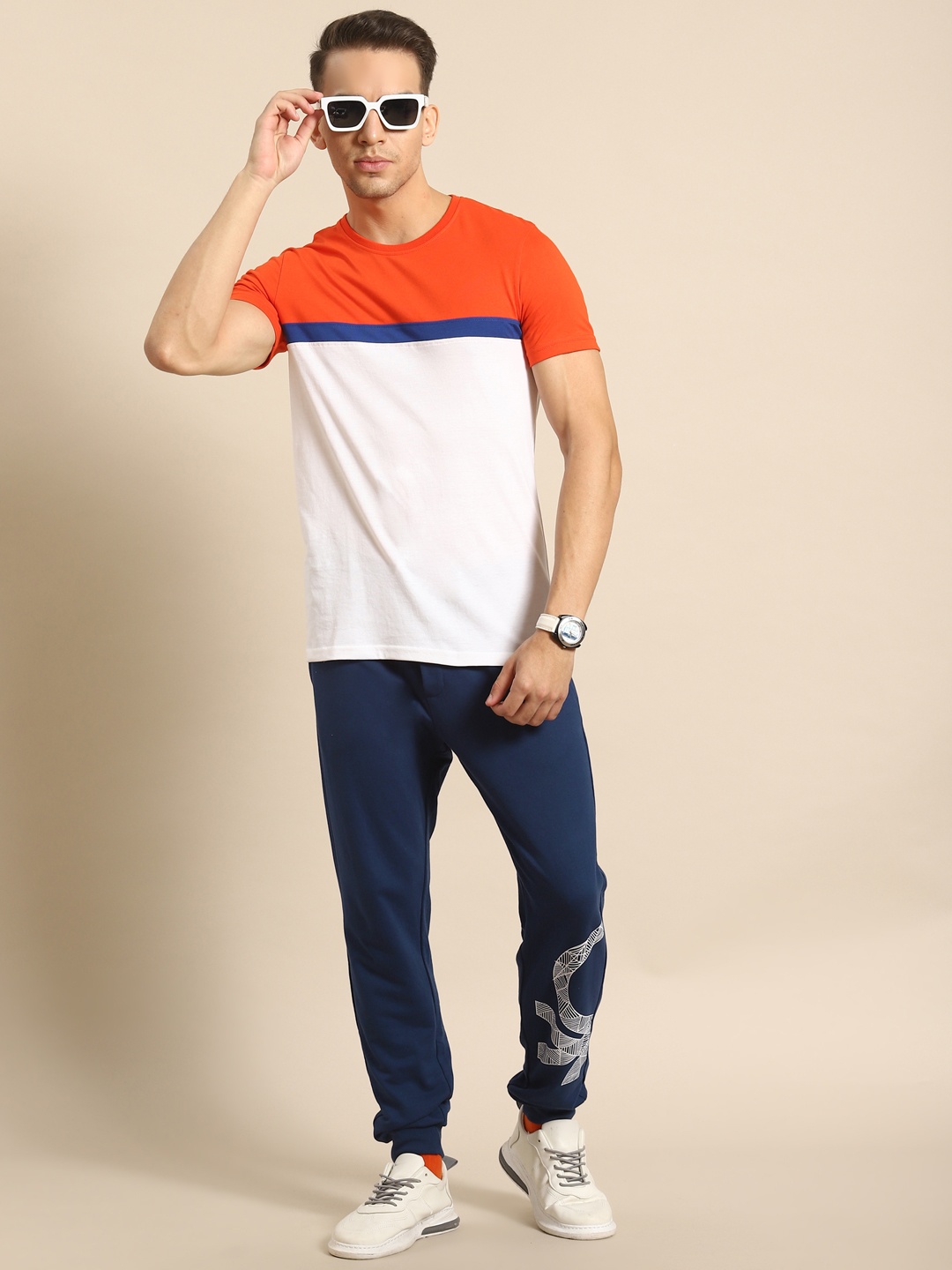 

United Colors of Benetton Men Navy Blue Solid Joggers with Printed Detail