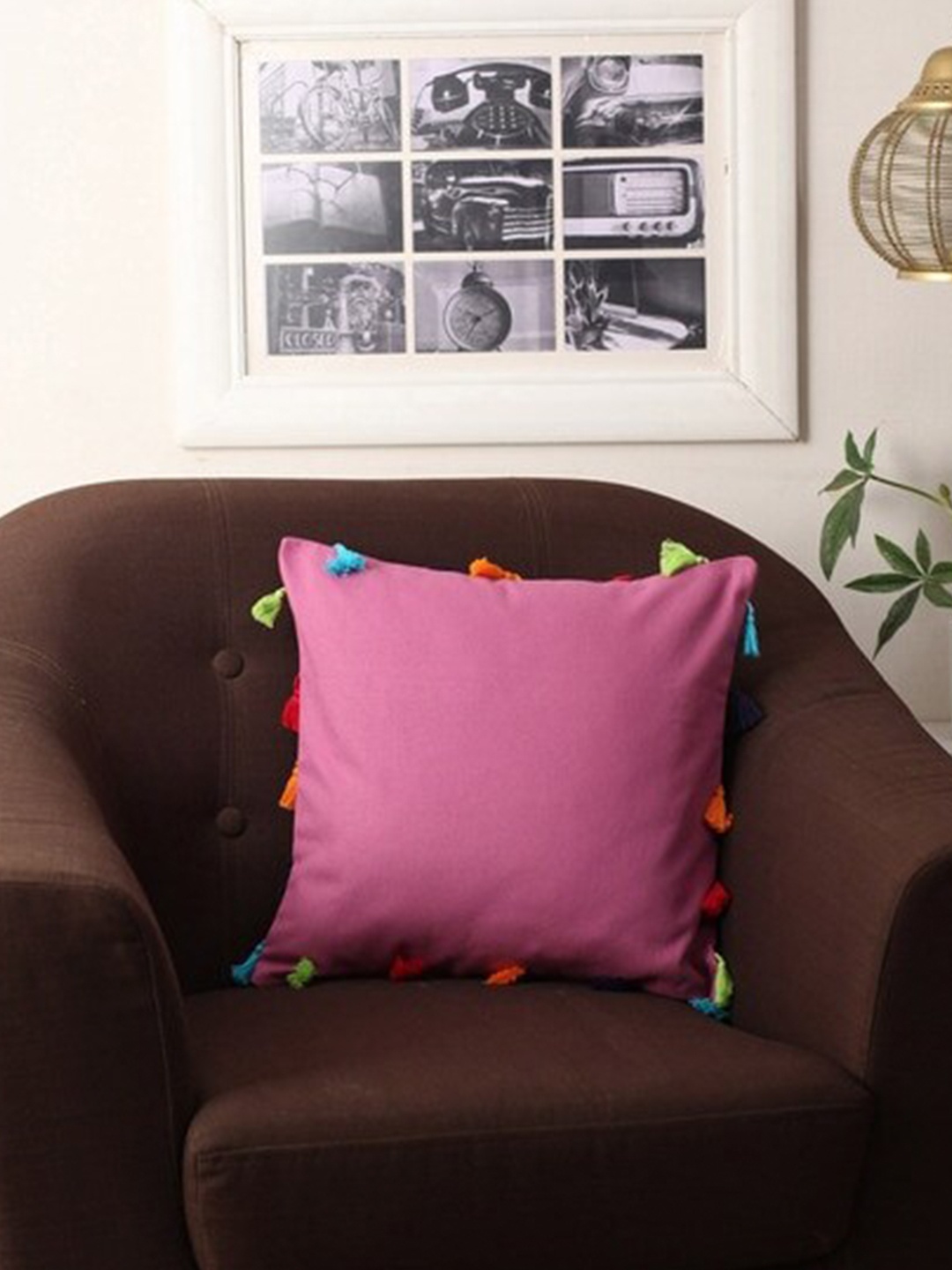 

Lushomes Unisex Pink Solid Square Cushion Cover With Multi-Coloured Tassels
