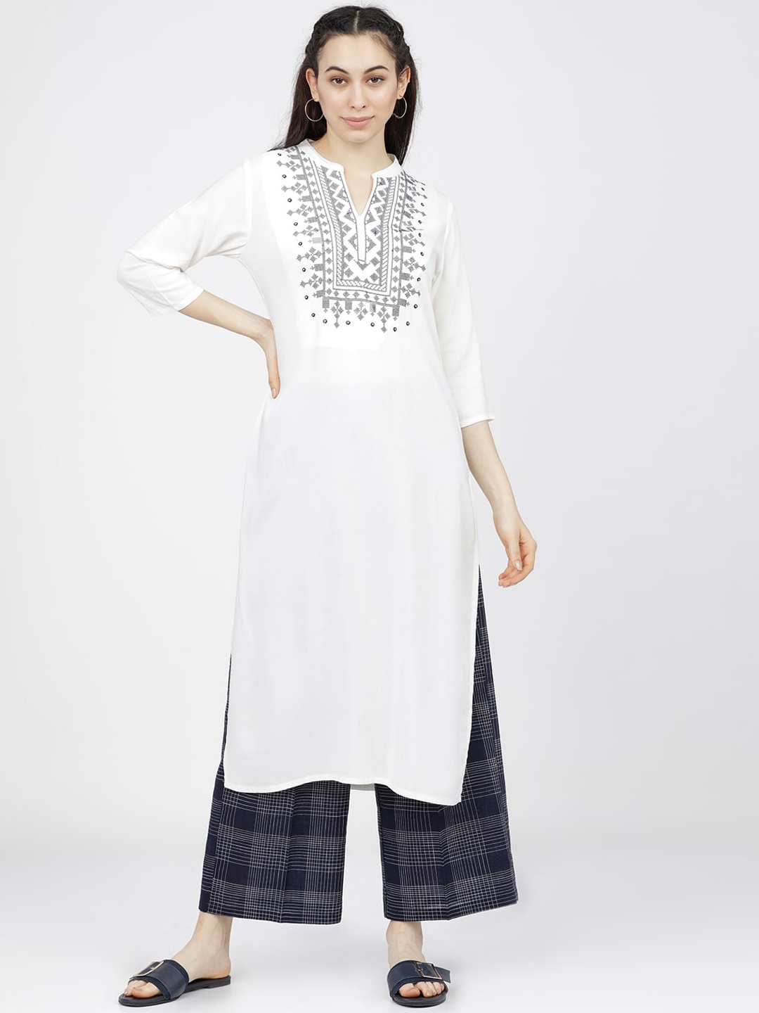 

Vishudh Women Off White Yoke Design Straight Kurta with Palazzos