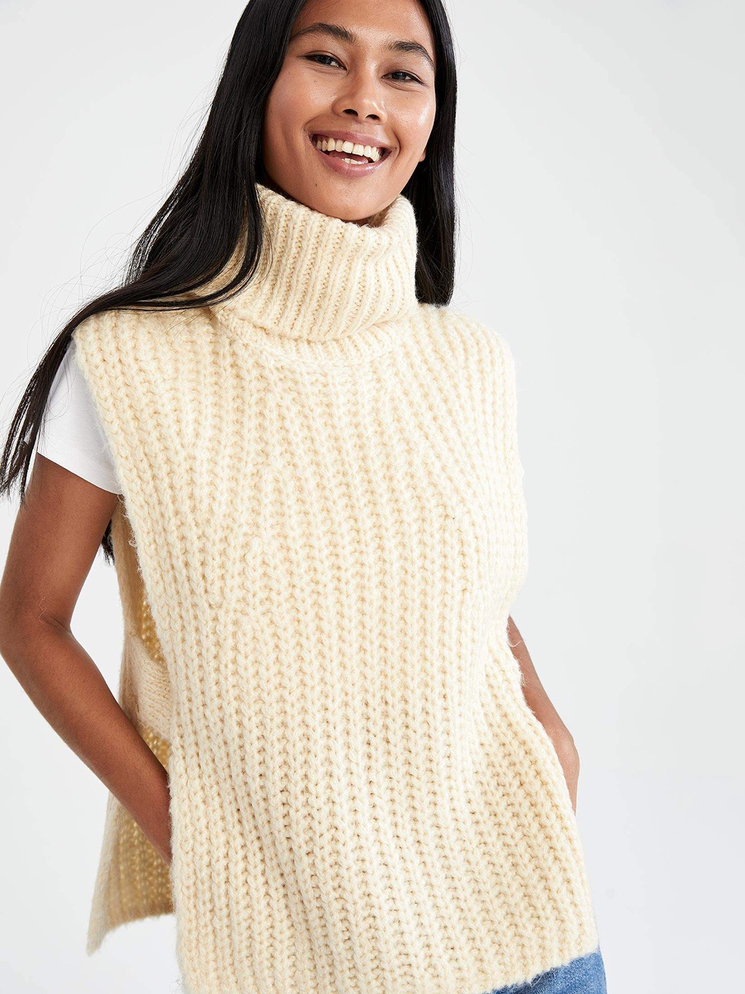 

DeFacto Women Cream-Coloured Solid Turtle Neck Poncho