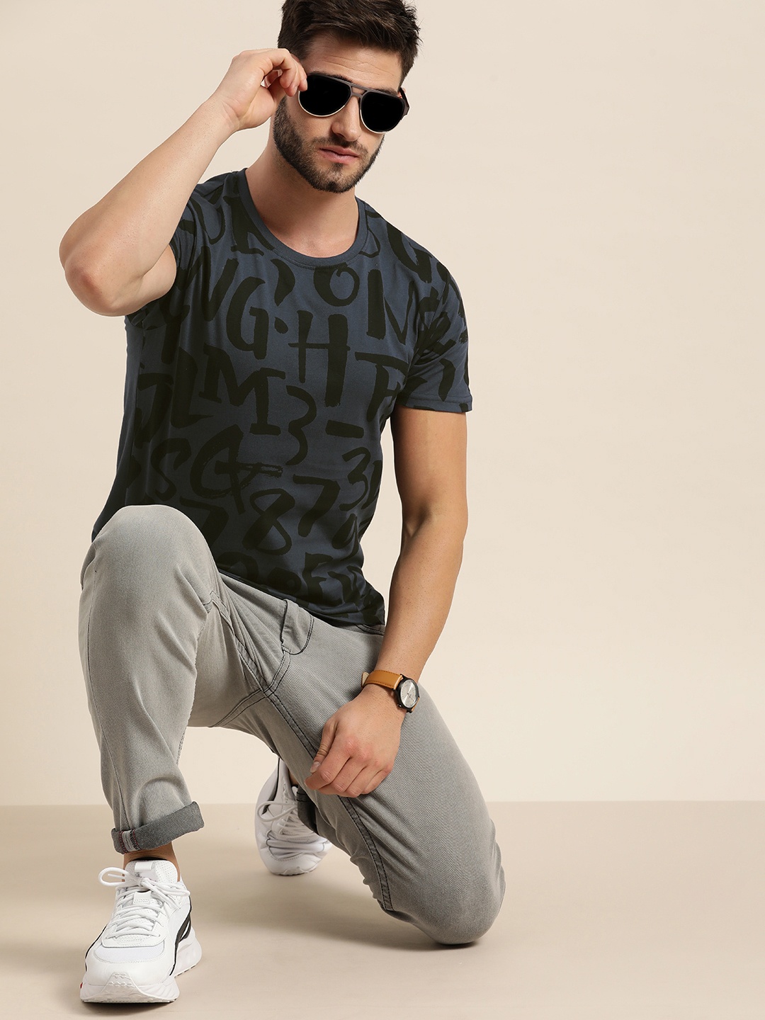 

Moda Rapido Men Grey & Black Typography Printed Casual T-shirt