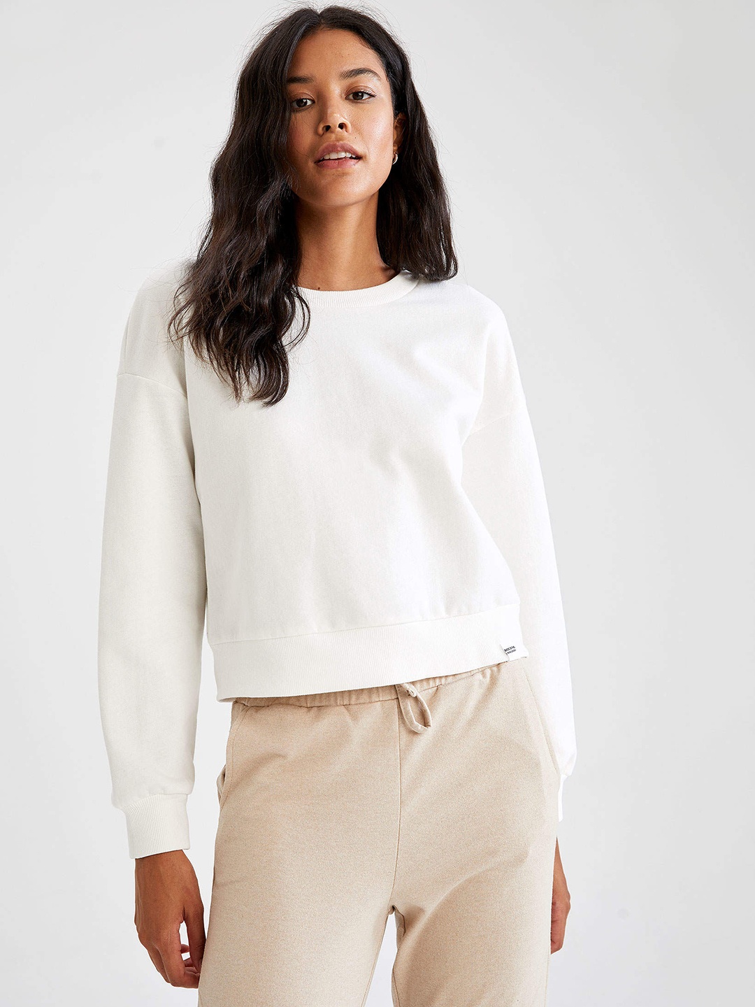 

DeFacto Women White Solid Crop Sweatshirt