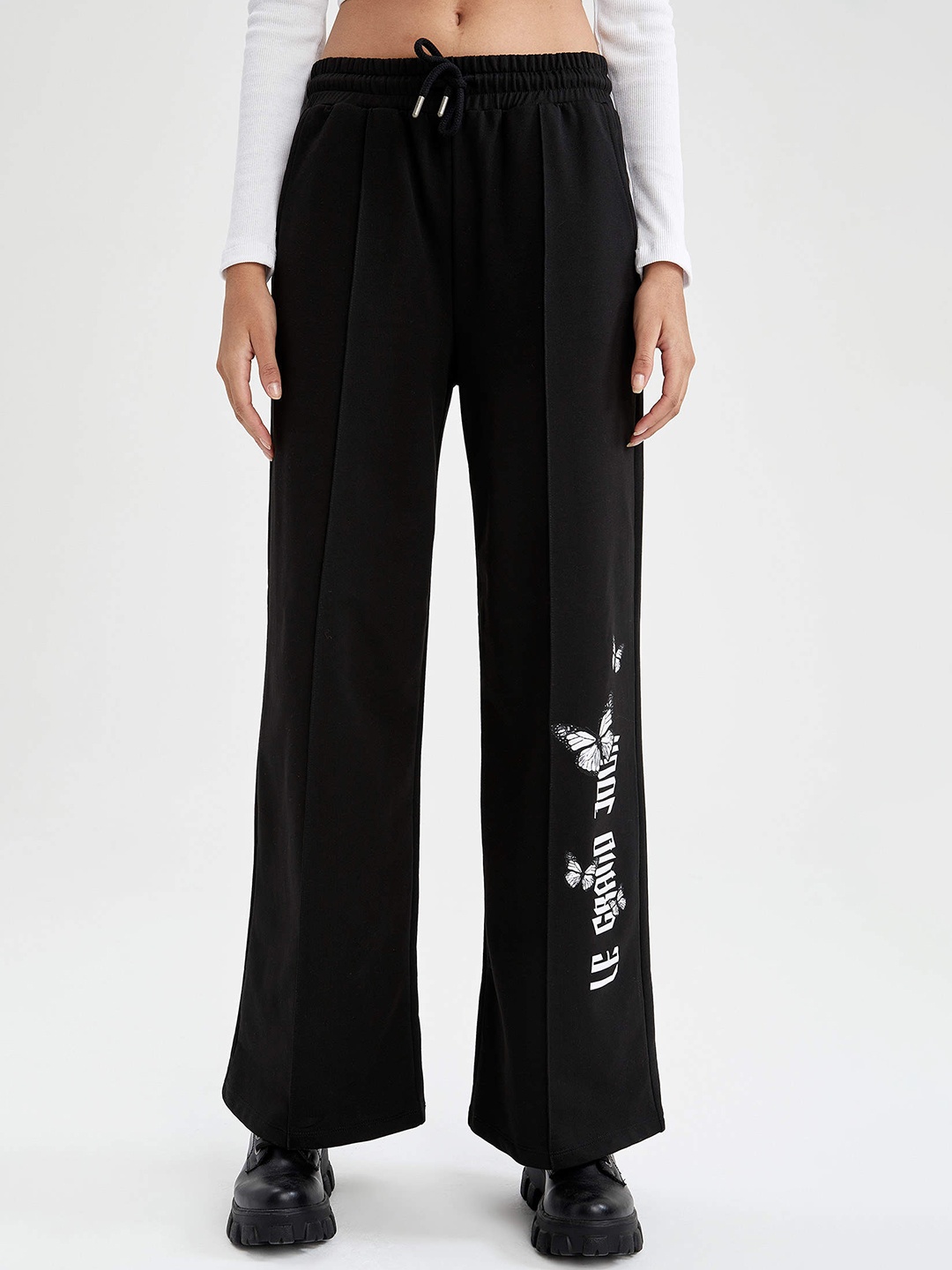 

DeFacto Women Black & White Typography Print Parallel Trousers