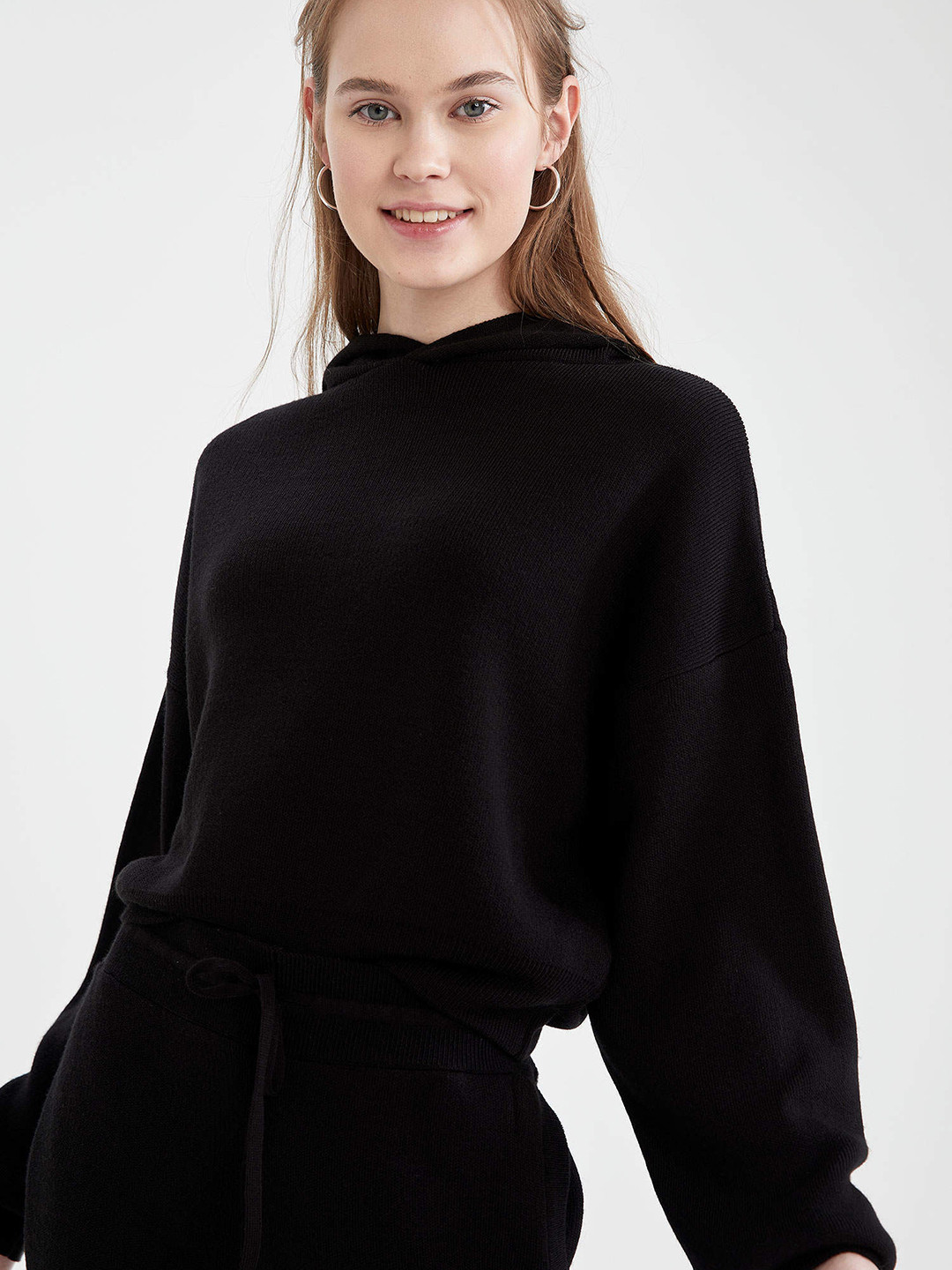 

DeFacto Women Black Solid Hooded Pullover
