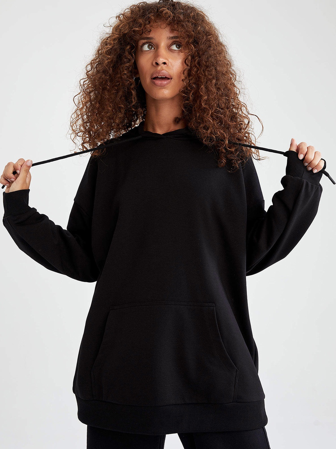 

DeFacto Women Black Solid Hooded Sweatshirt