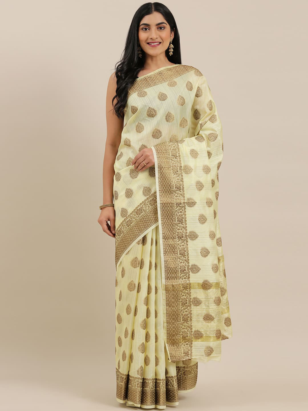 

The Chennai Silks Yellow & Tan Ethnic Motifs Saree
