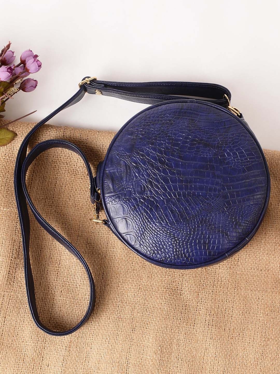 

Vivinkaa Navy Blue Textured Swagger Sling Bag With Detachable Strap