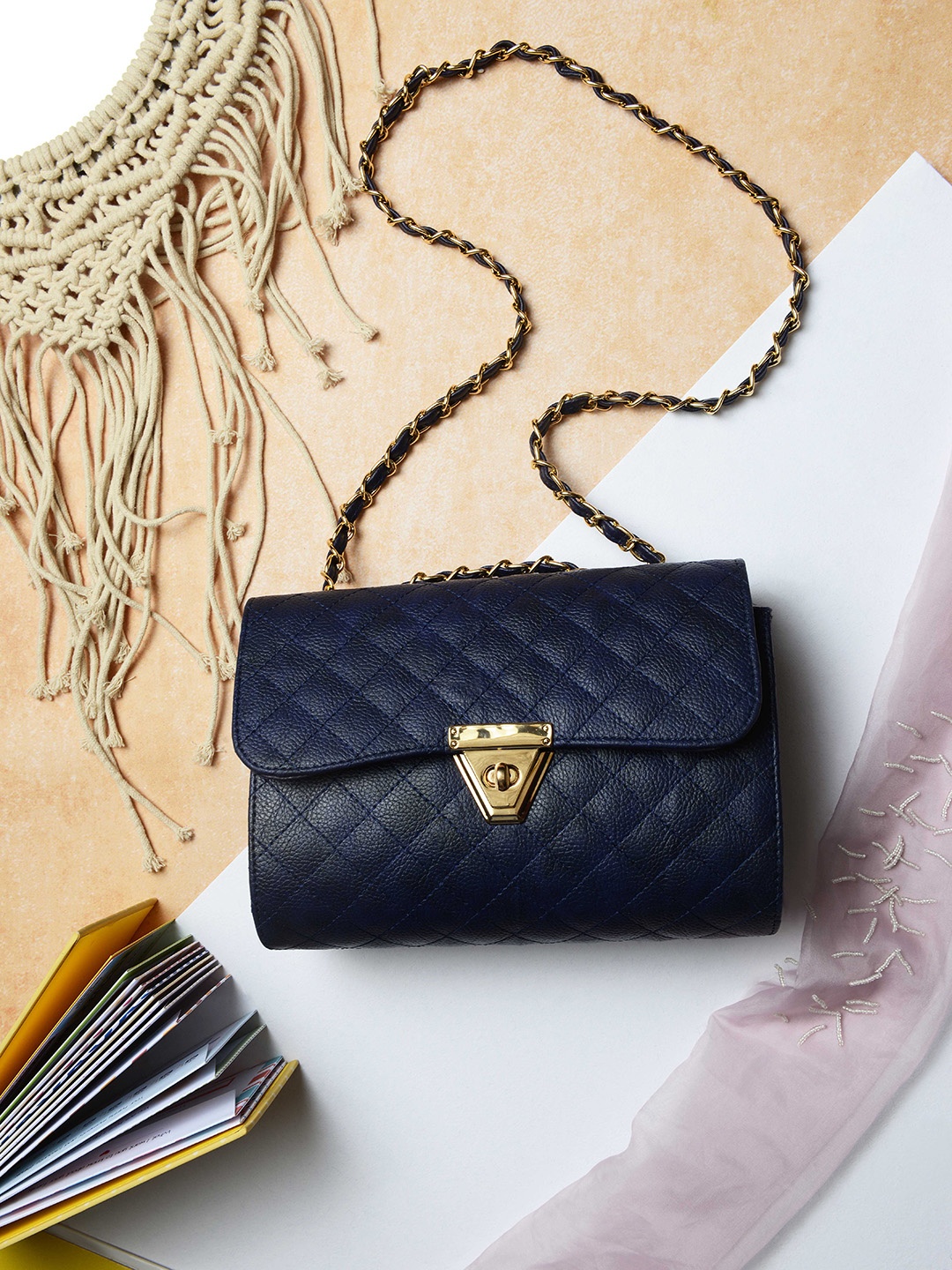 

Vivinkaa Navy Blue Geometric Textured Structured Handheld Bag with Quilted