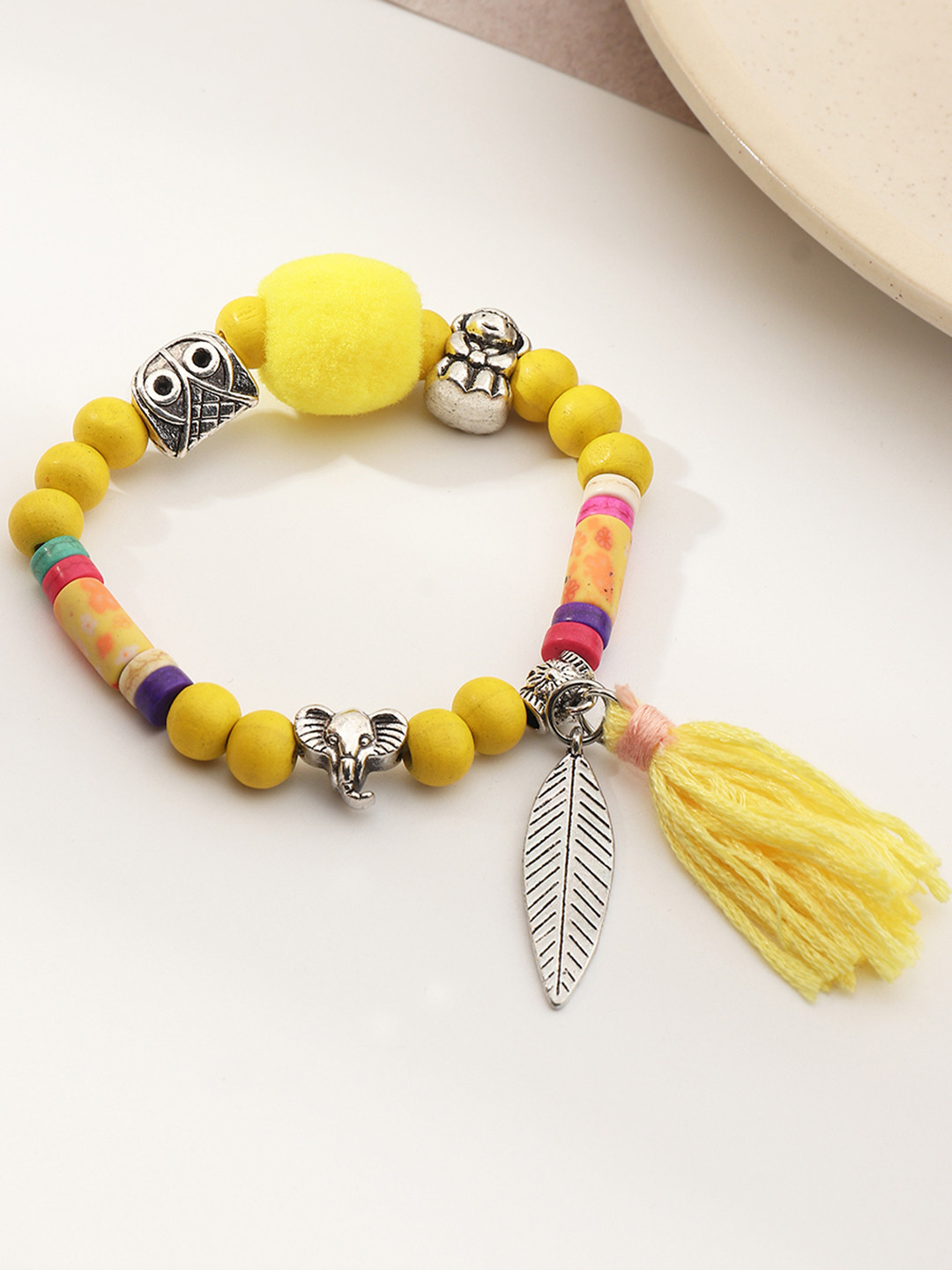 

URBANIC Women Yellow & Silver-Toned Elasticated Beaded Bracelet