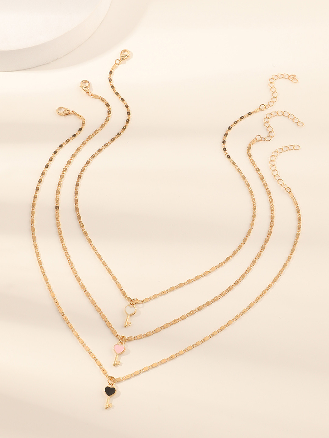 

URBANIC St of 3 Gold-Toned Necklace with Pendants