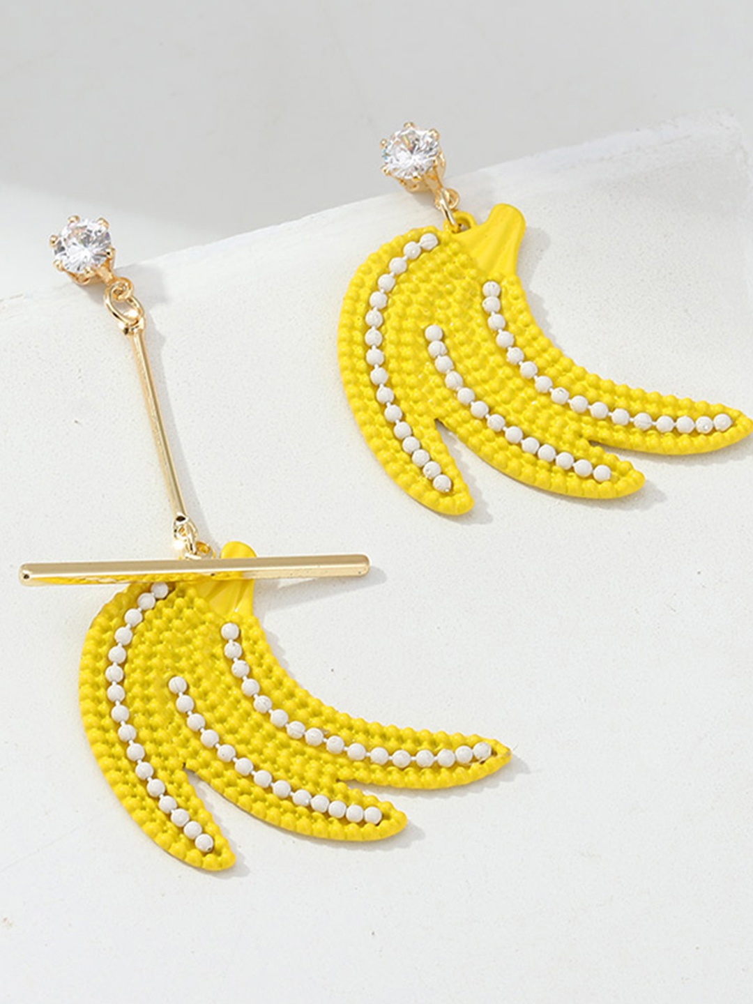 

URBANIC Gold-Toned & Yellow Enamelled Stone-Studded Banana Drop Earrings