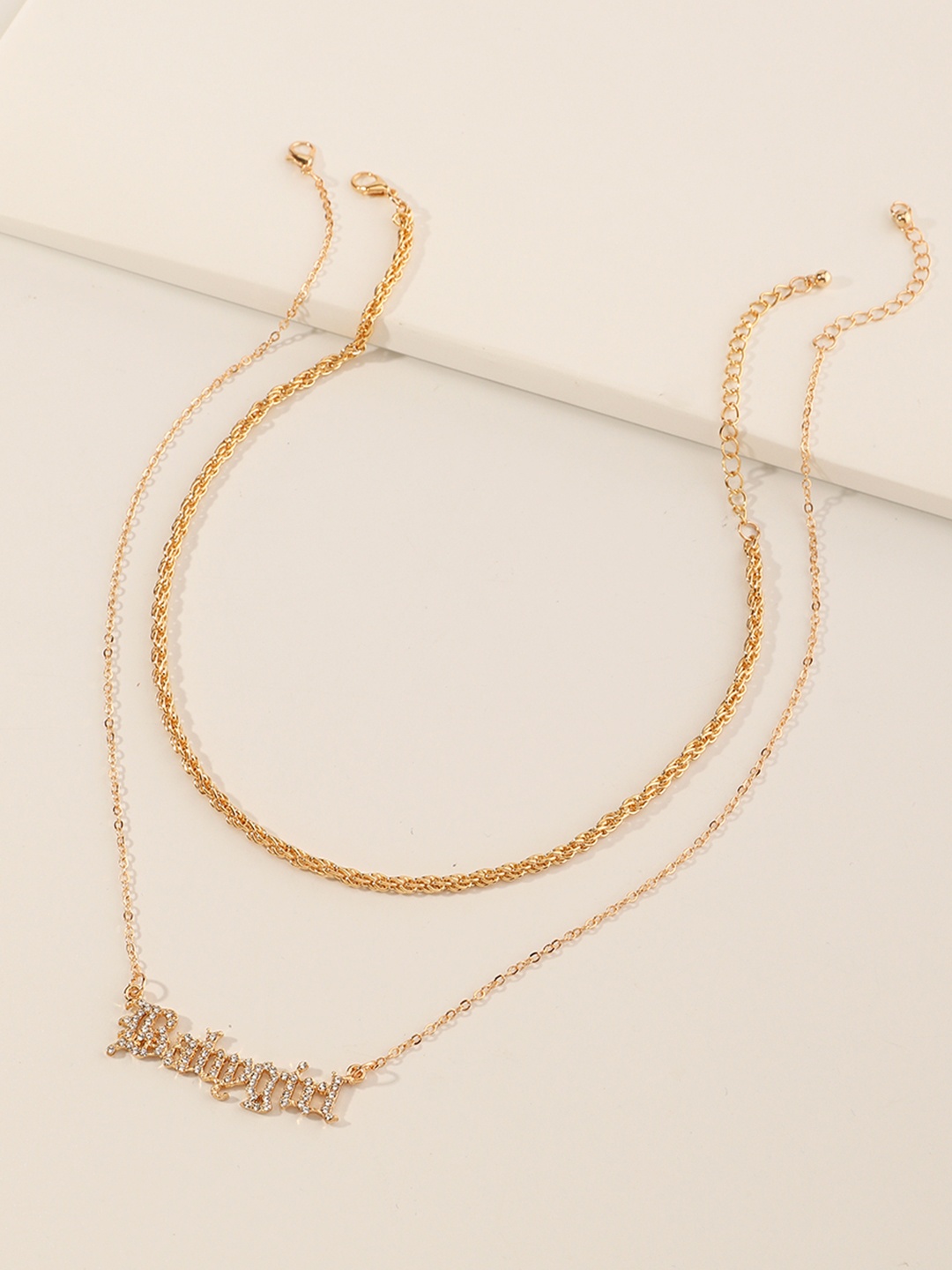 

URBANIC Gold-Toned Babygirl Stone-Studded Layered Necklace