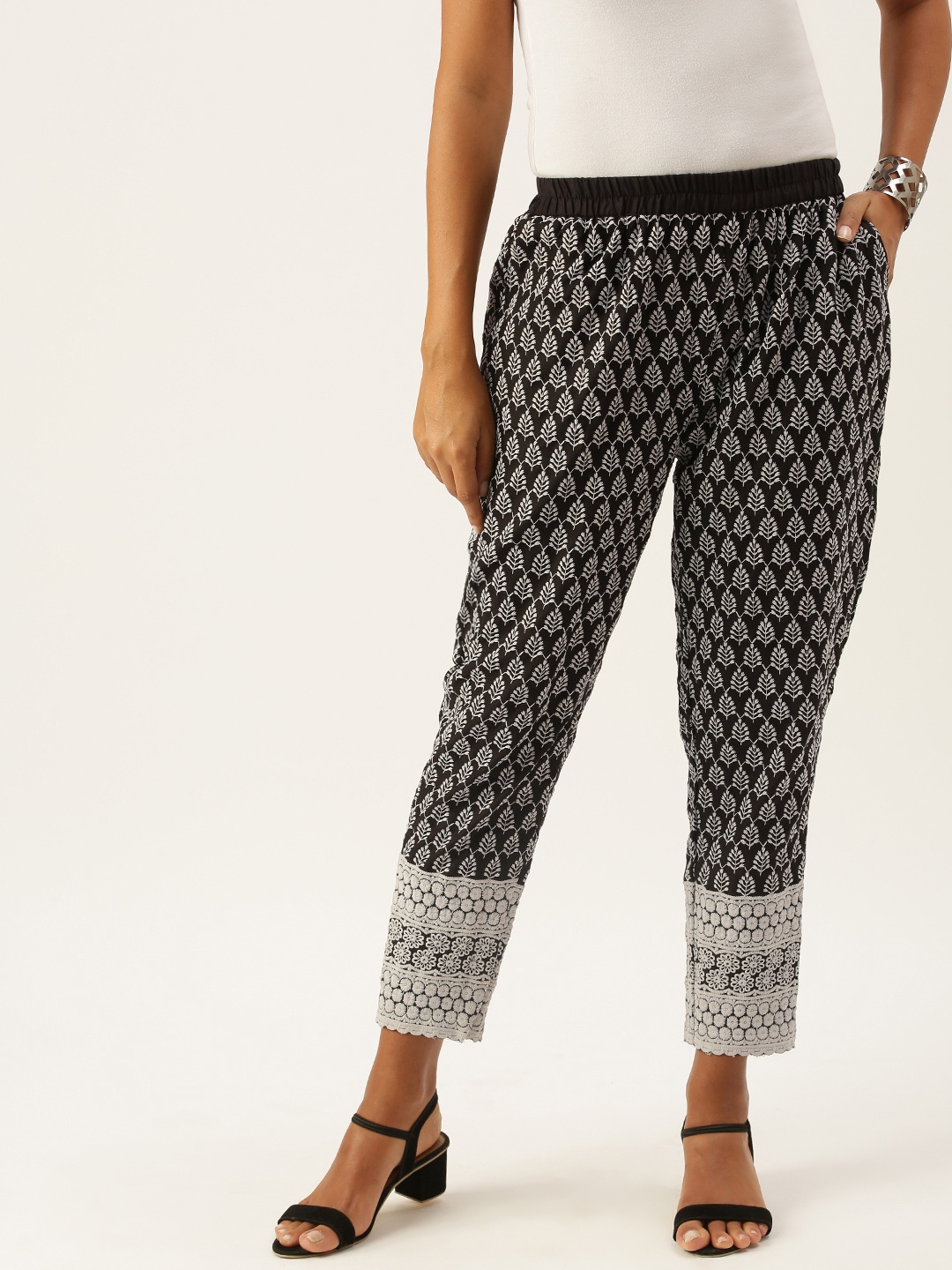

SWAGG INDIA Women Black Ethnic Motifs Embroidered Pleated Trousers