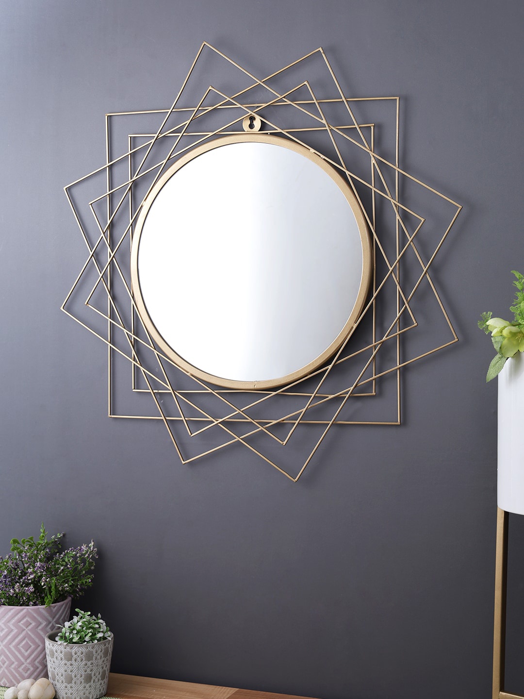 

Aapno Rajasthan Gold-Toned Handcrafted Metallic Frame Wall Mirror