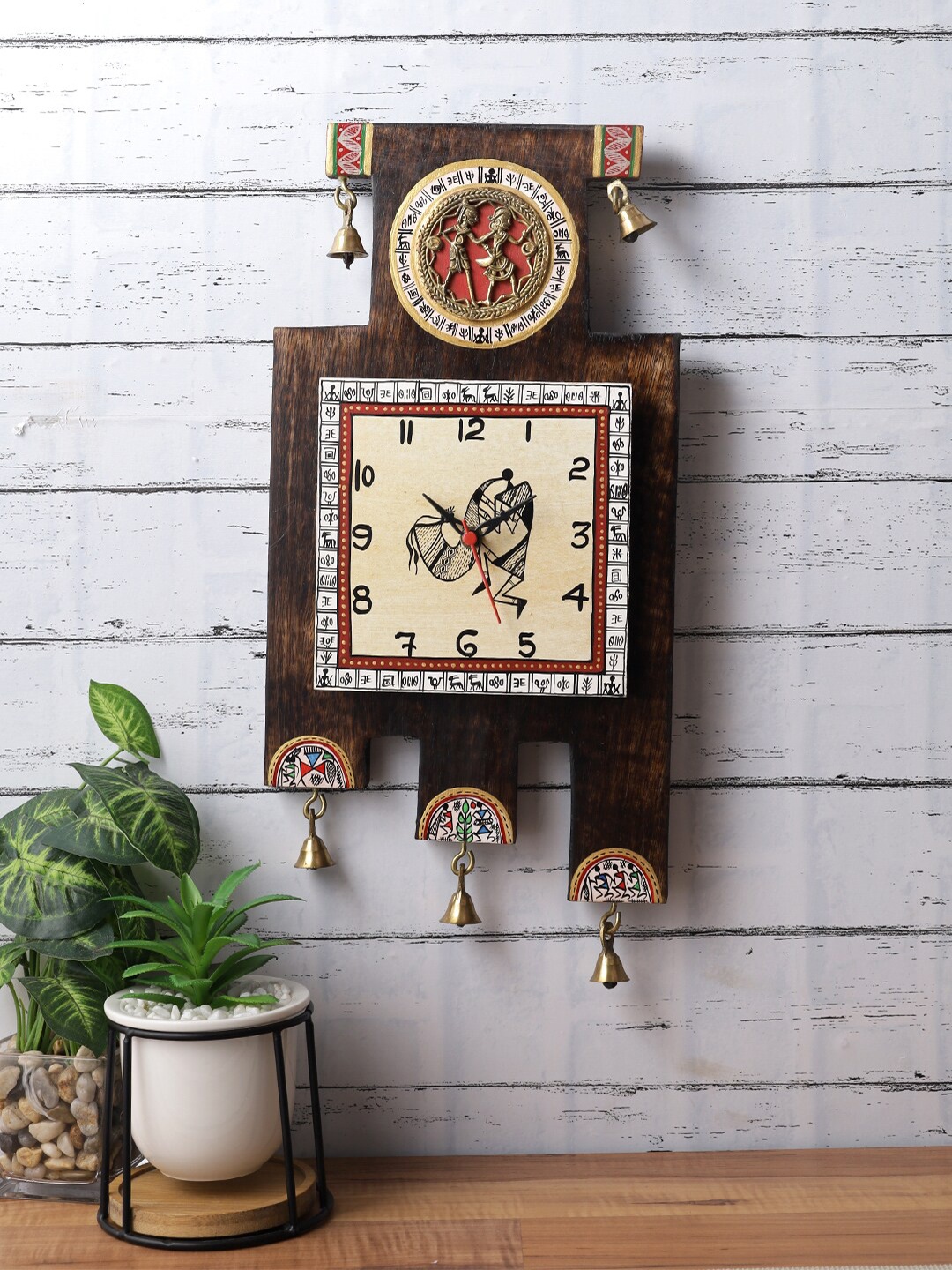 

Aapno Rajasthan Brown & Red Textured Abstract Shaped Traditional Wall Clock