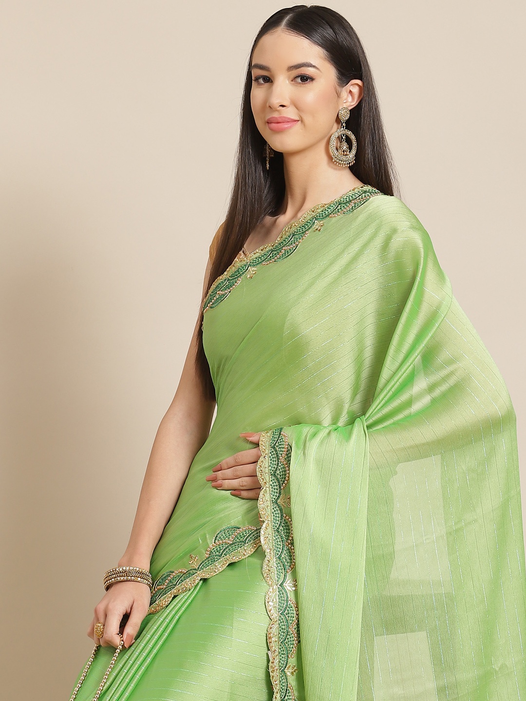 

Anouk Green Striped Beads and Stones Saree