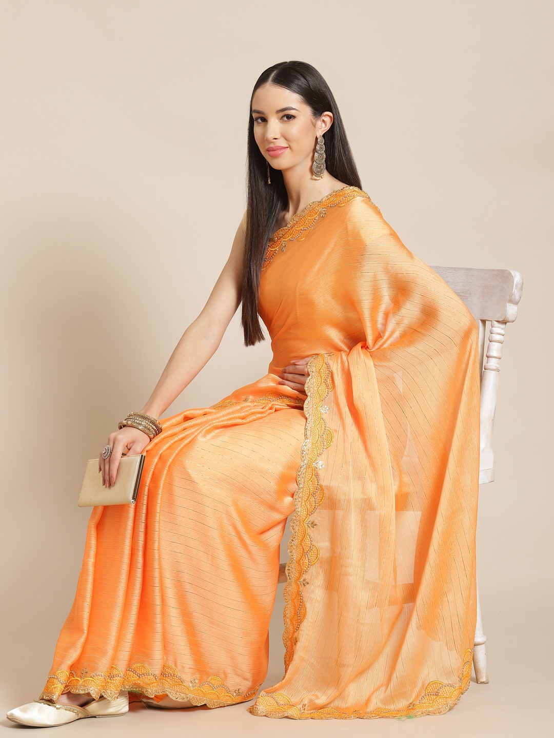 

Anouk Orange Striped Beads and Stones Saree