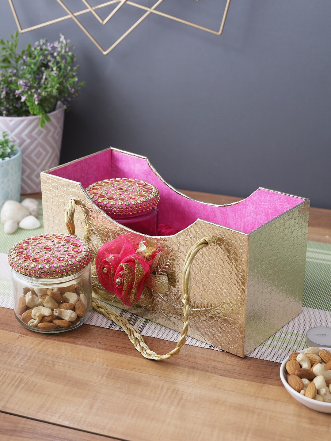 

Aapno Rajasthan Golden & Pink Box Shaped Basket with 2 Glass Jars, Gold