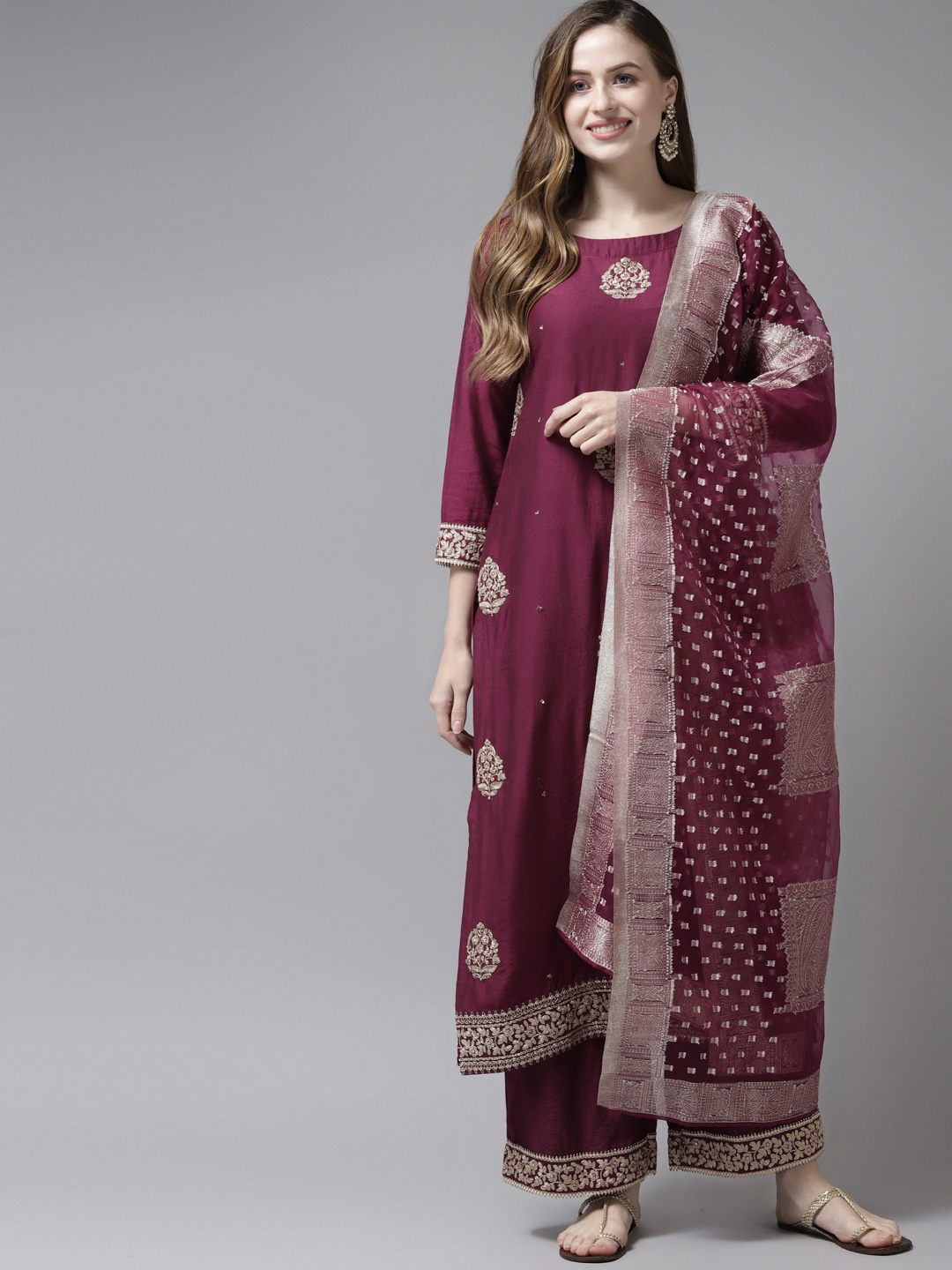 

Indo Era Women Purple & Golden Embroidered Kurta with Palazzos & With Dupatta