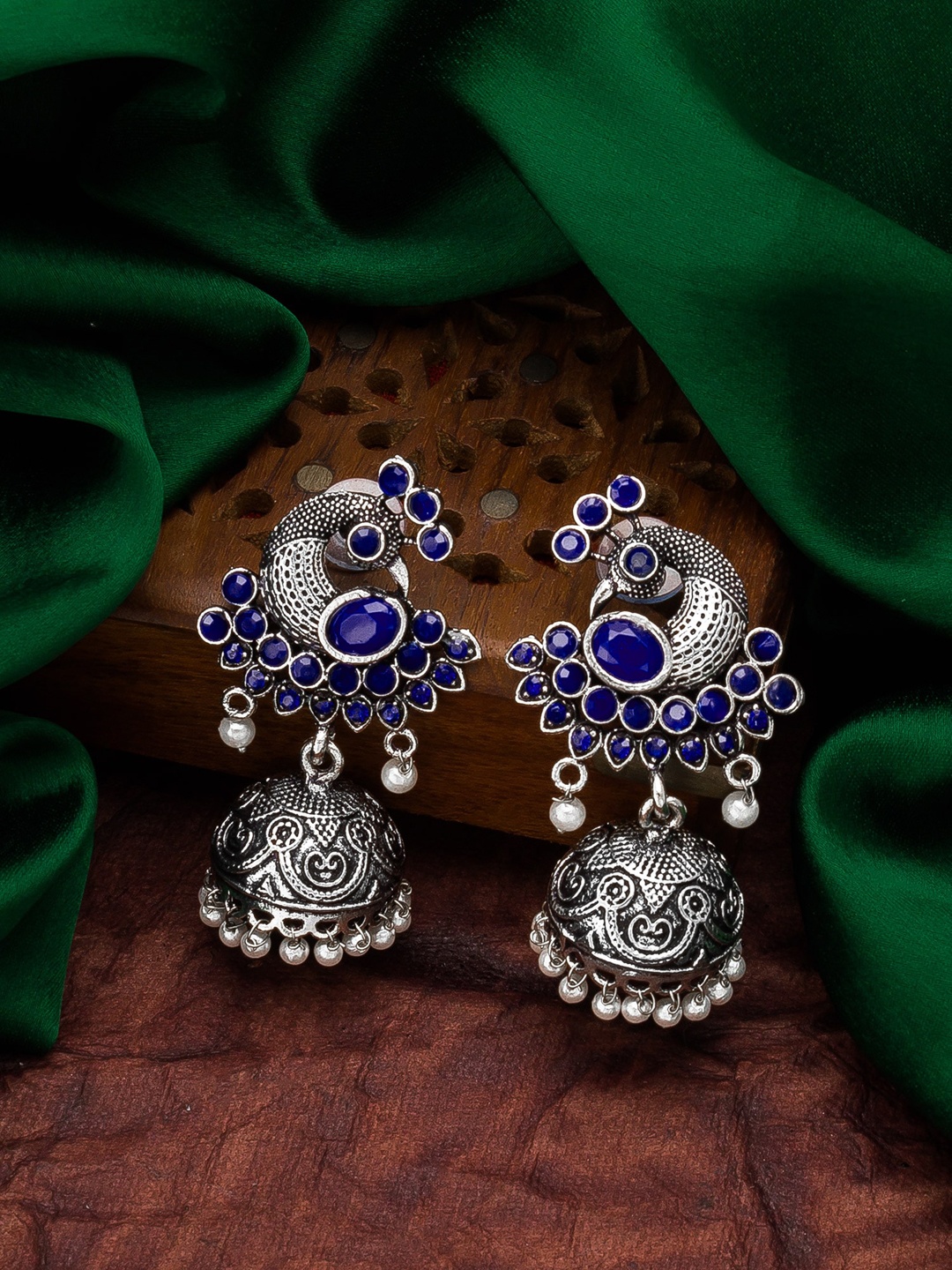 

aadita Silver-Toned Geometric Jhumkas Earrings