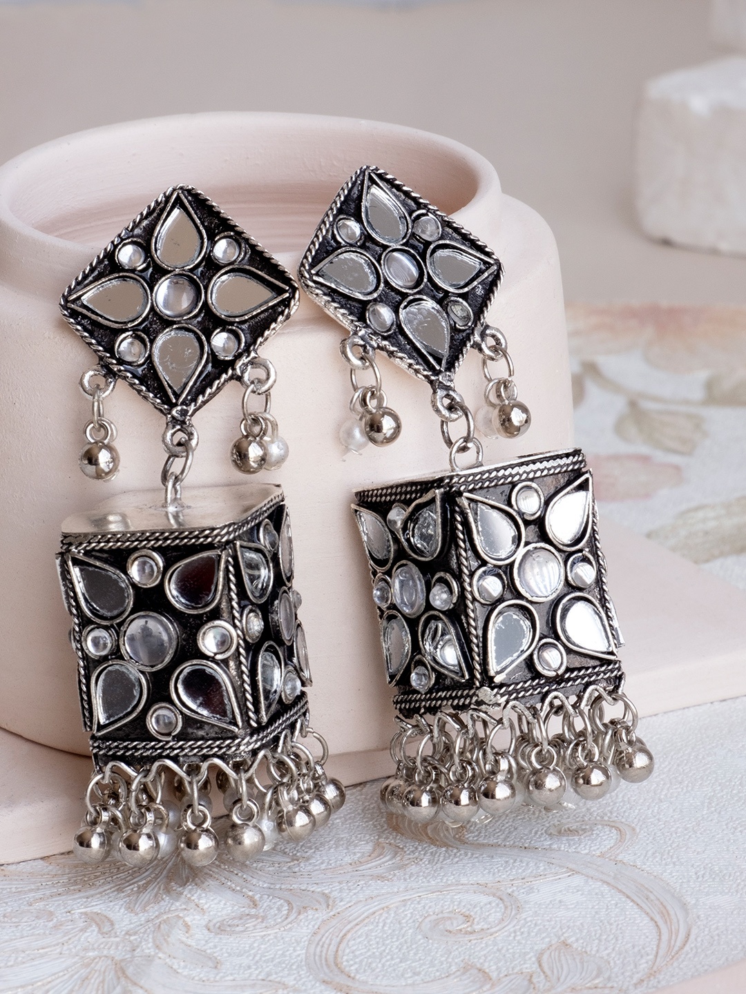 

Infuzze Silver Plated Silver-Toned Contemporary Jhumkas Earrings