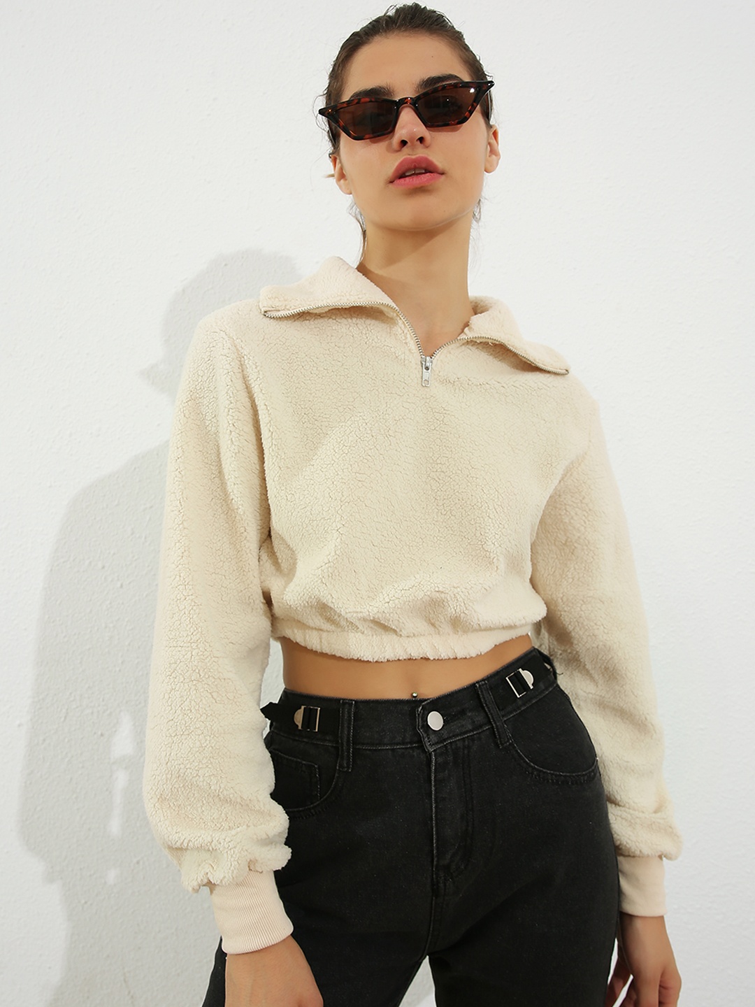 

URBANIC Women Beige Solid Cropped Sweatshirt
