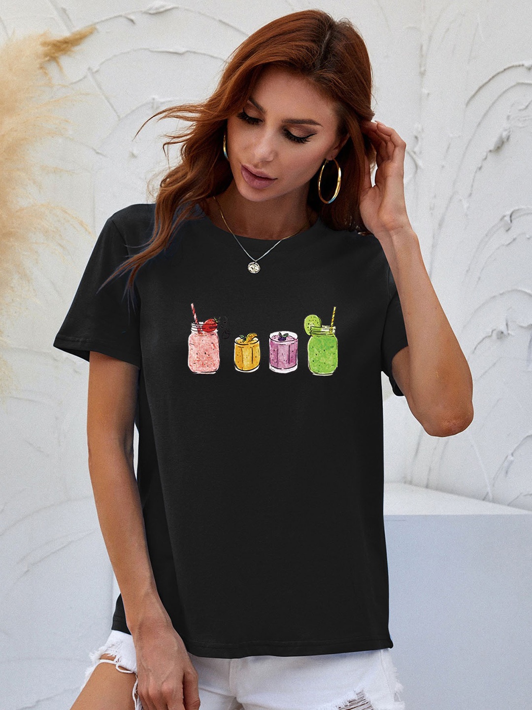 

URBANIC Women Black & Green Pure Cotton Printed T-shirt