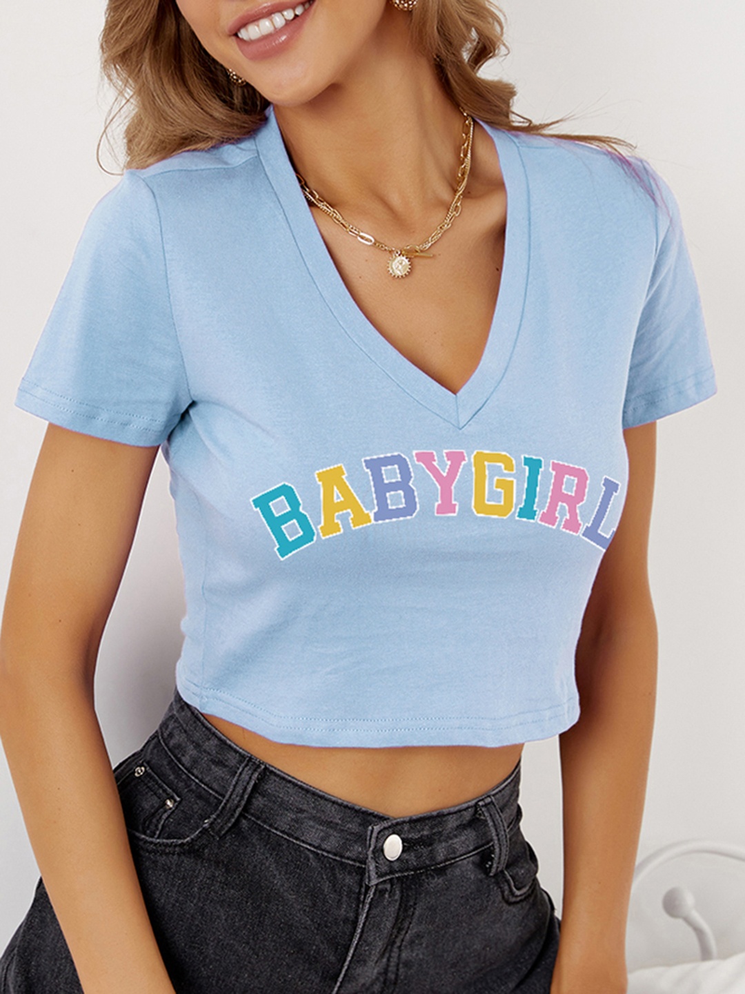 

URBANIC Women Blue Cotton Typography Printed V-Neck T-shirt