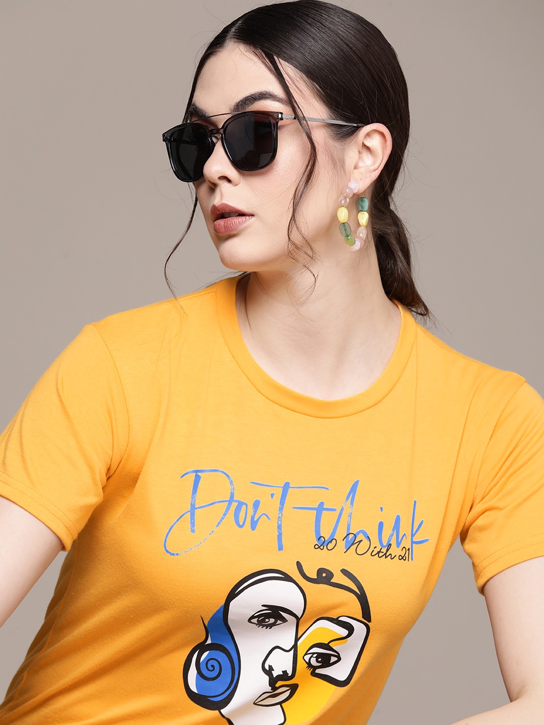 

URBANIC Women Yellow Typography Printed T-shirt