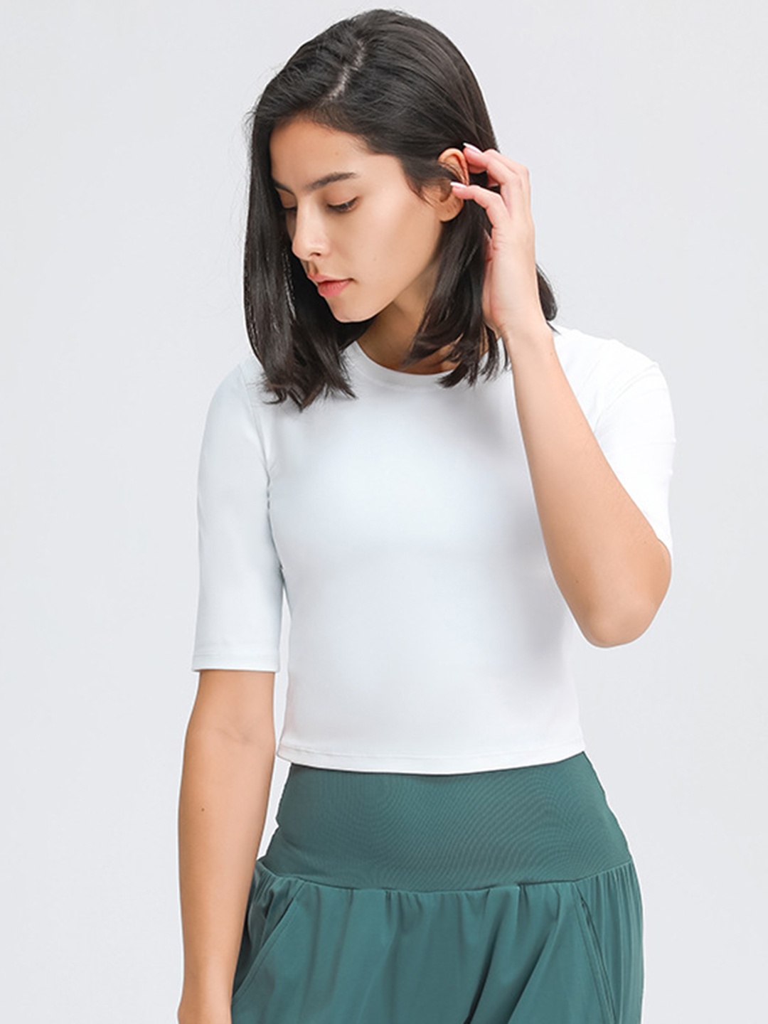 

URBANIC Women White Crop T-shirt