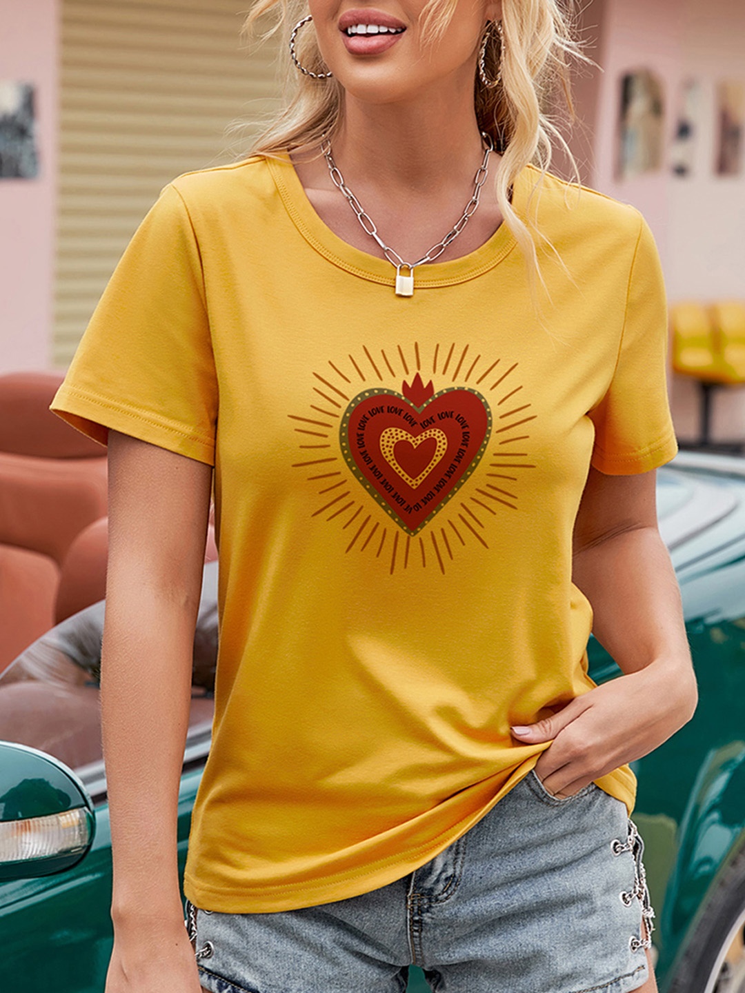 

URBANIC Women Yellow & Red Graphic Printed T-shirt