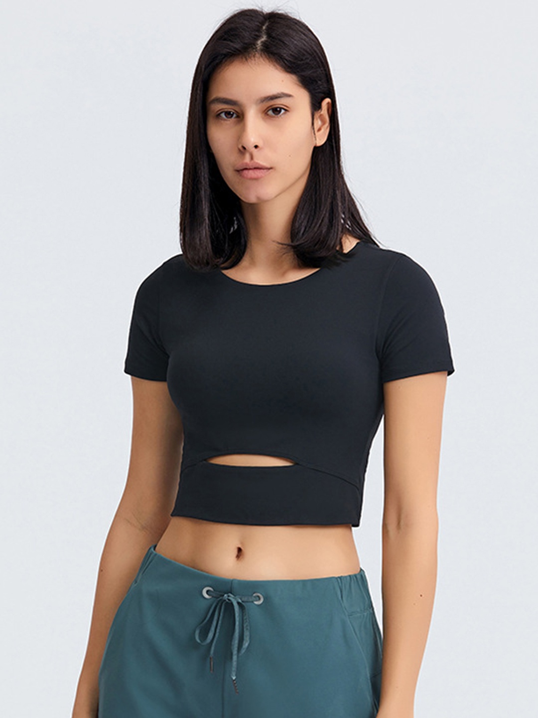 

URBANIC Women Black Solid Cut Out T-Shirt