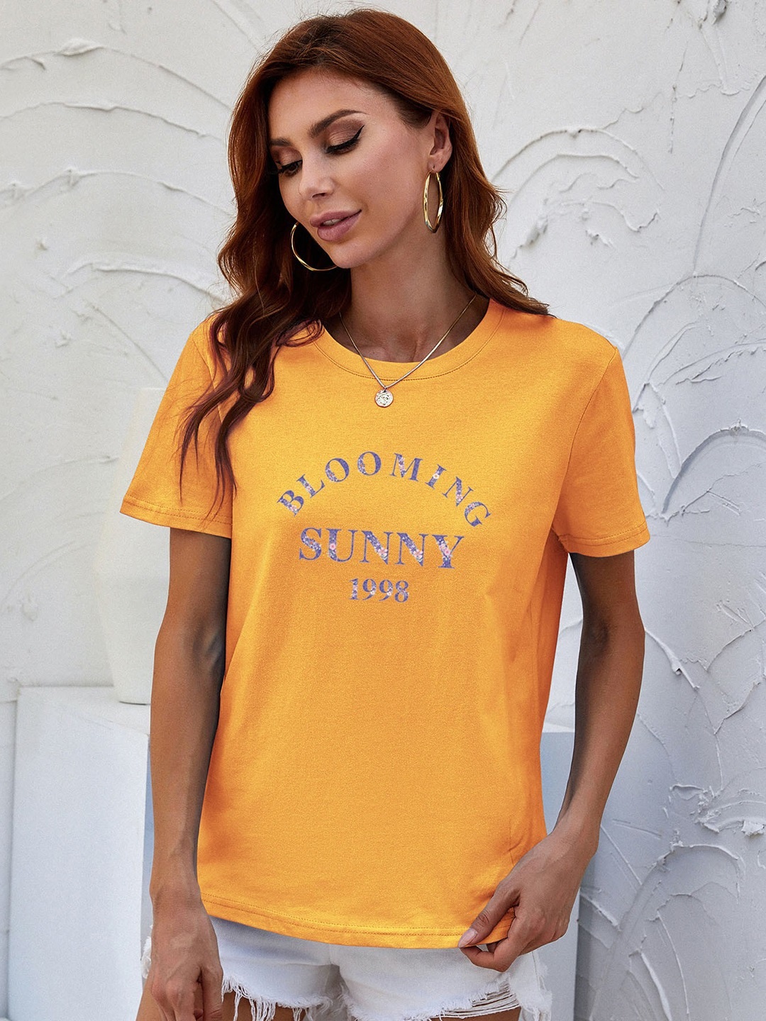 

URBANIC Women Yellow Pure Cotton Typography Printed T-shirt